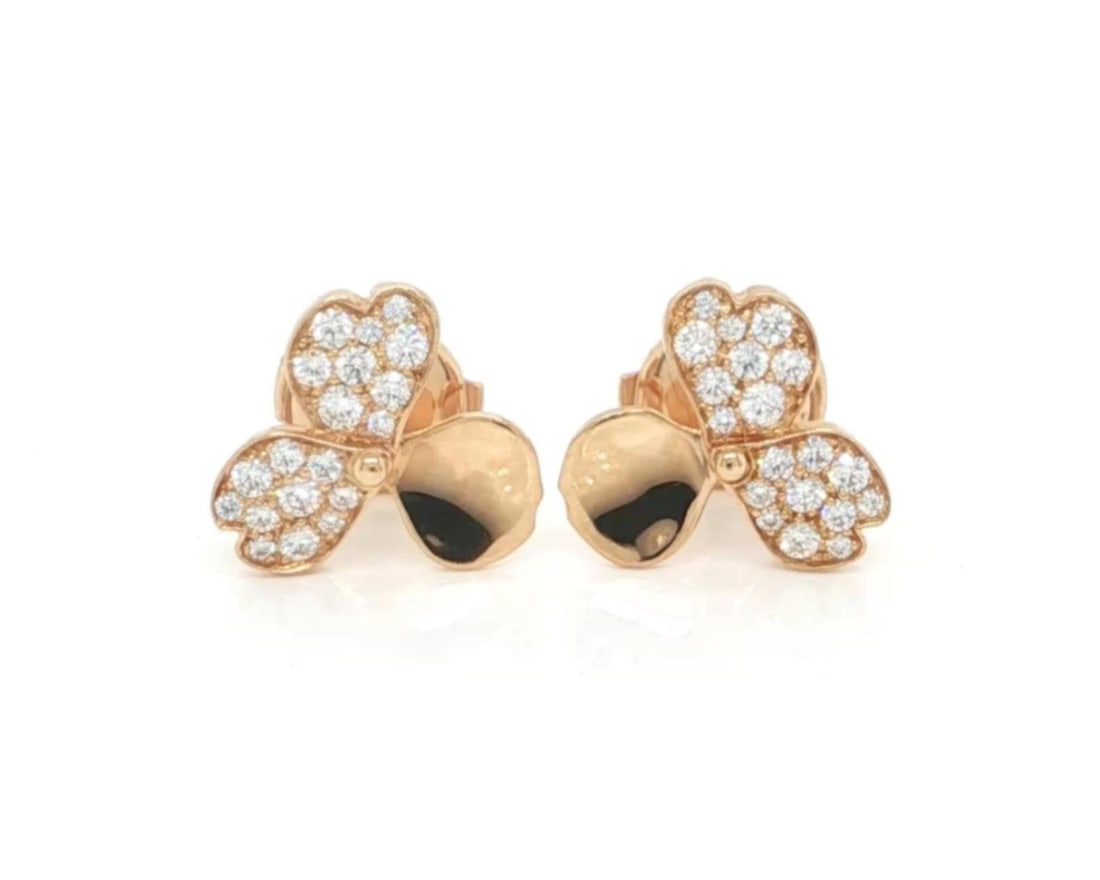 18k Rose Gold Paper Flowers Stud Earrings with Diamonds by Tiffany & Co.: 18k Rose Gold Paper Flowers Stud Earrings with Diamonds by Tiffany & Co. These authentic Tiffany & Co. Paper Flower stud earrings are crafted from solid 18k rose gold and feature a delicate floral des