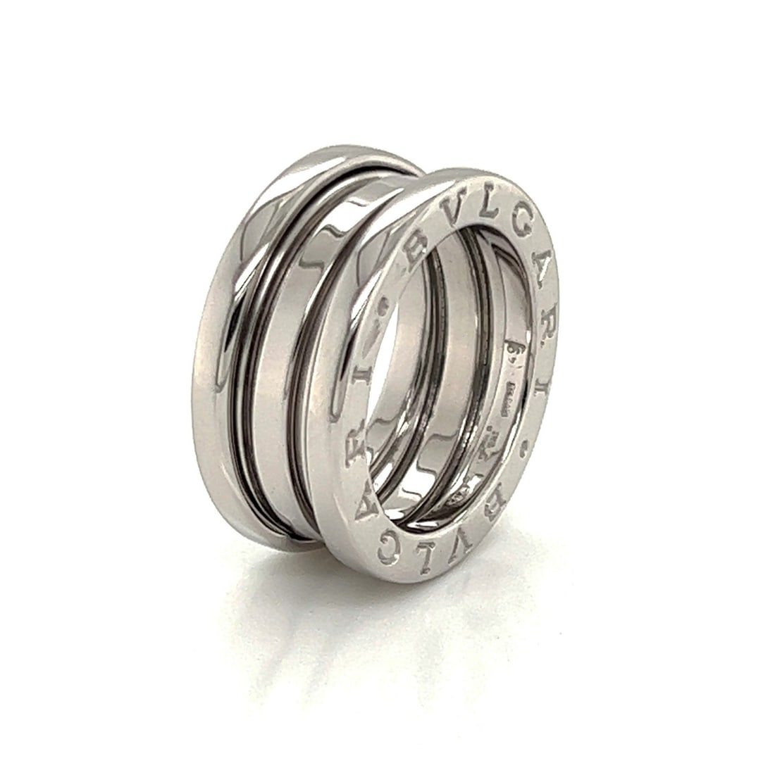 Bvlgari B.zero1 18k White Gold Spiral Ring Three-Band Size 4.5 EU 49: Bvlgari B.zero1 18k White Gold Spiral Ring Three-Band Size 4.5 EU 49 This Bvlgari B.zero1 three-band ring is crafted in solid 18k white gold, featuring the iconic spiral architecture and a high-polish