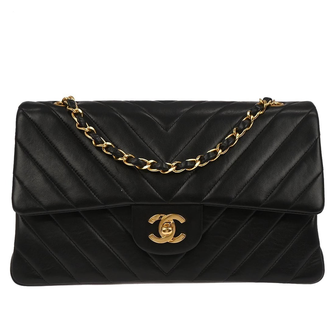 Black Chevron Lambskin Double Flap Shoulder Bag by Chanel Timeless Collection: Black Chevron Lambskin Double Flap Shoulder Bag by Chanel Timeless Collection This Chanel Timeless Classic Double Flap Bag features a sophisticated chevron pattern in black lambskin leather. Designed