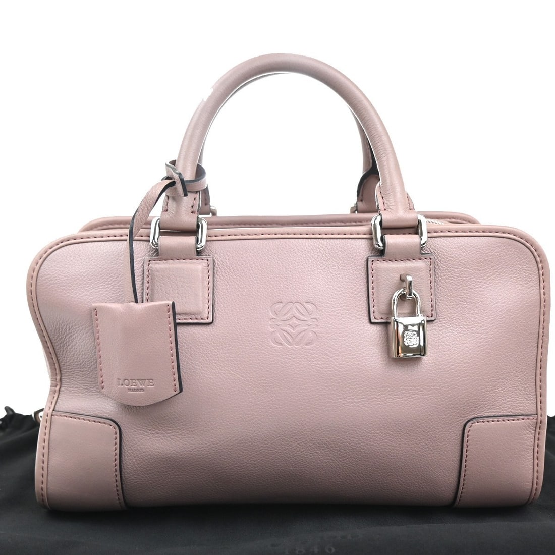 Pink Amazona NM Leather Handbag by Loewe 28cm x 17cm x 13cm: Pink Amazona NM Leather Handbag by Loewe 28cm x 17cm x 13cm This Loewe Amazona NM Bag is crafted from leather in a pink color, designed for women. The bag features a structured silhouette and is made