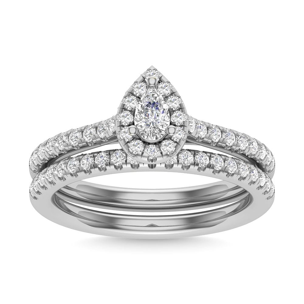 Diamond 3/4 Ct.Tw. Pear Cut Bridal Ring in 14K White Gold: Diamond 3/4 Ct.Tw. Pear Cut Bridal Ring in 14K White Gold Diamond 3/4 Ct.Tw. Pear Cut Bridal Ring in 14K White Gold 14k White Gold Stone Color: G-h Stone Clarity: I2 Each ring is presented in standard