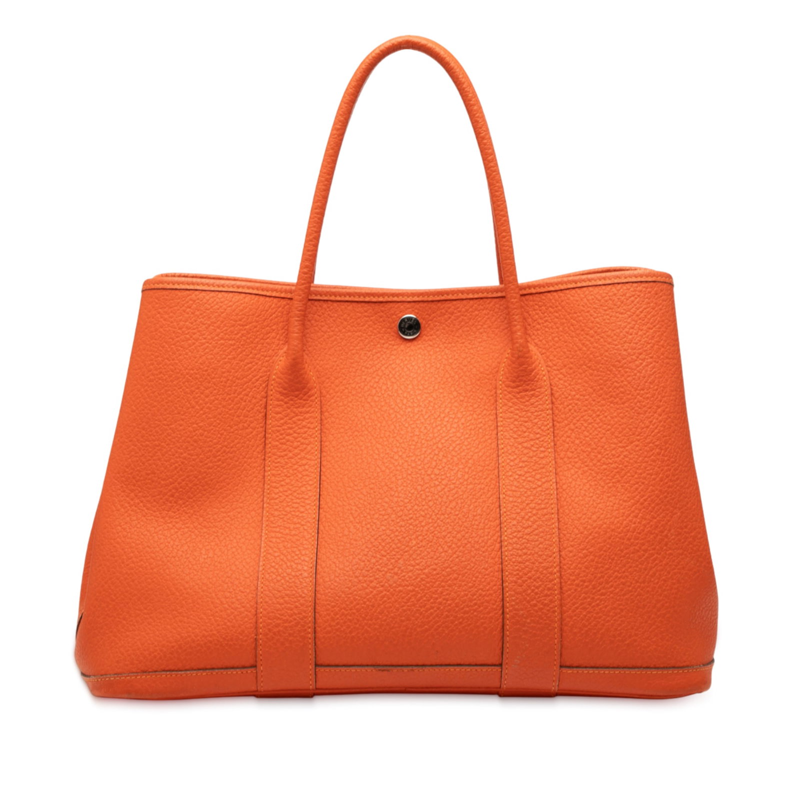 Hermes Negonda Garden Party 36 Orange Leather Handbag: Hermes Negonda Garden Party 36 Orange Leather Handbag The Hermes Negonda Garden Party 36 is a stylish and functional bag crafted from high-quality Negonda leather in a vibrant orange color. This spaci