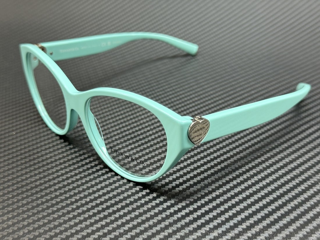 Tiffany & Co. TF2244 8388 Tiffany Blue 53mm Eyeglasses with Authenticity Certificate: Tiffany & Co. TF2244 8388 Tiffany Blue 53mm Eyeglasses with Authenticity Certificate Elevate your eyewear collection with these stylish Tiffany Blue eyeglasses from Tiffany & Co. Designed for women, t