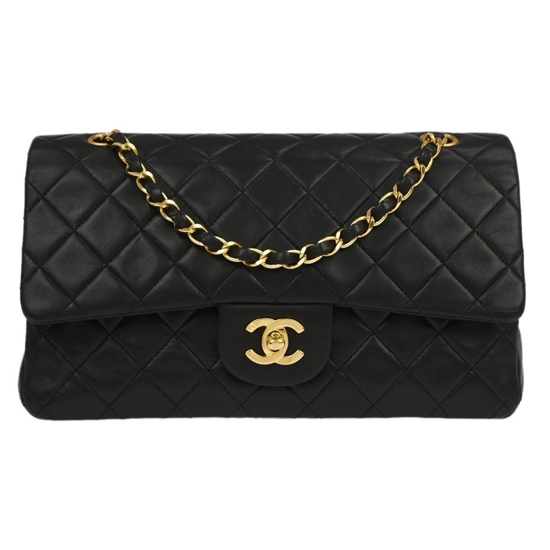 Medium Classic Double Flap Shoulder Bag in Black Lambskin by Chanel: Medium Classic Double Flap Shoulder Bag in Black Lambskin by Chanel This Chanel Classic Double Flap shoulder bag is crafted from black lambskin leather and features a medium size with a turn lock clos