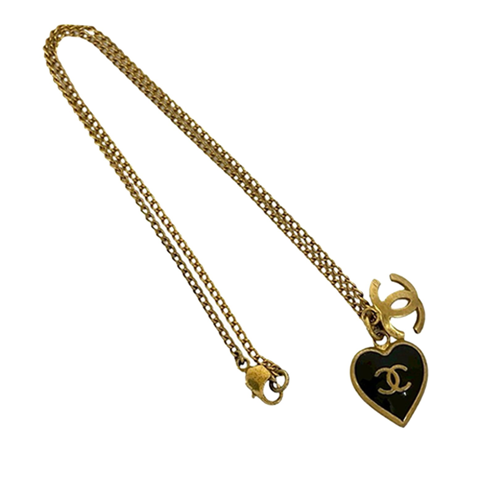 Chanel Enamel Heart and CC Pendant Gold Plated Necklace: Chanel Enamel Heart and CC Pendant Gold Plated Necklace This Chanel necklace features a gold-plated metal body with two pendants: a heart-shaped pendant and a CC logo pendant, both adorned with enamel