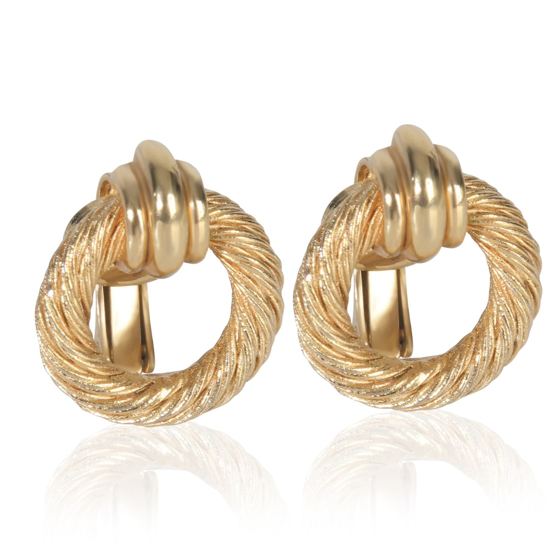Women's 18mm Gold Plated Earrings by Christian Dior: Women's 18mm Gold Plated Earrings by Christian Dior These Christian Dior gold-plated earrings feature a classic design, crafted in Italy for women's wear. Without any stones, these earrings offer a ti