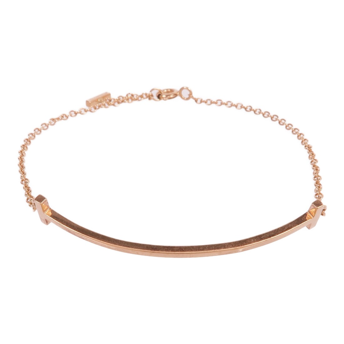 T Smile 18K Rose Gold Bracelet by Tiffany and Co: T Smile 18K Rose Gold Bracelet by Tiffany and Co This Tiffany & Co. T Smile Bracelet is crafted from 18K rose gold, featuring a sleek and modern design. Made in the United States, the bracelet is desi