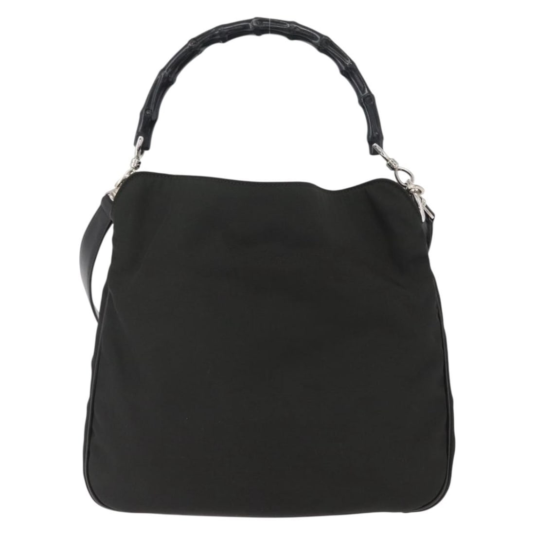 Black Nylon Bamboo Handle Shoulder Bag by Gucci Vintage Collection: Black Nylon Bamboo Handle Shoulder Bag by Gucci Vintage Collection This Gucci Vintage Bamboo Handle Bag features a black nylon exterior with signature bamboo handles. The bag is designed for women and