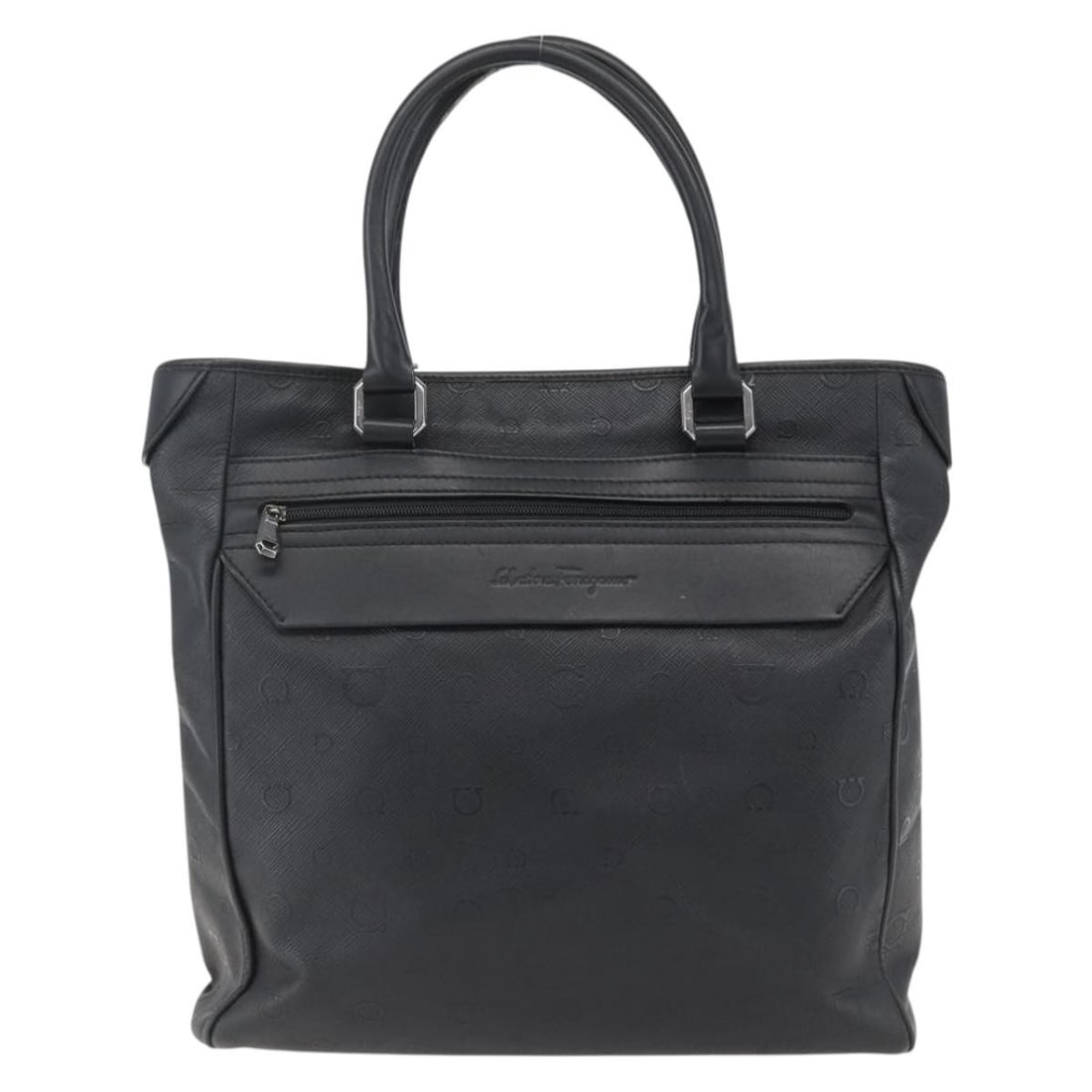 Black Leather Vintage Tote by Salvatore Ferragamo Italy: Black Leather Vintage Tote by Salvatore Ferragamo Italy This Salvatore Ferragamo vintage tote bag is crafted from black leather and designed for women. It features a spacious interior with multiple po