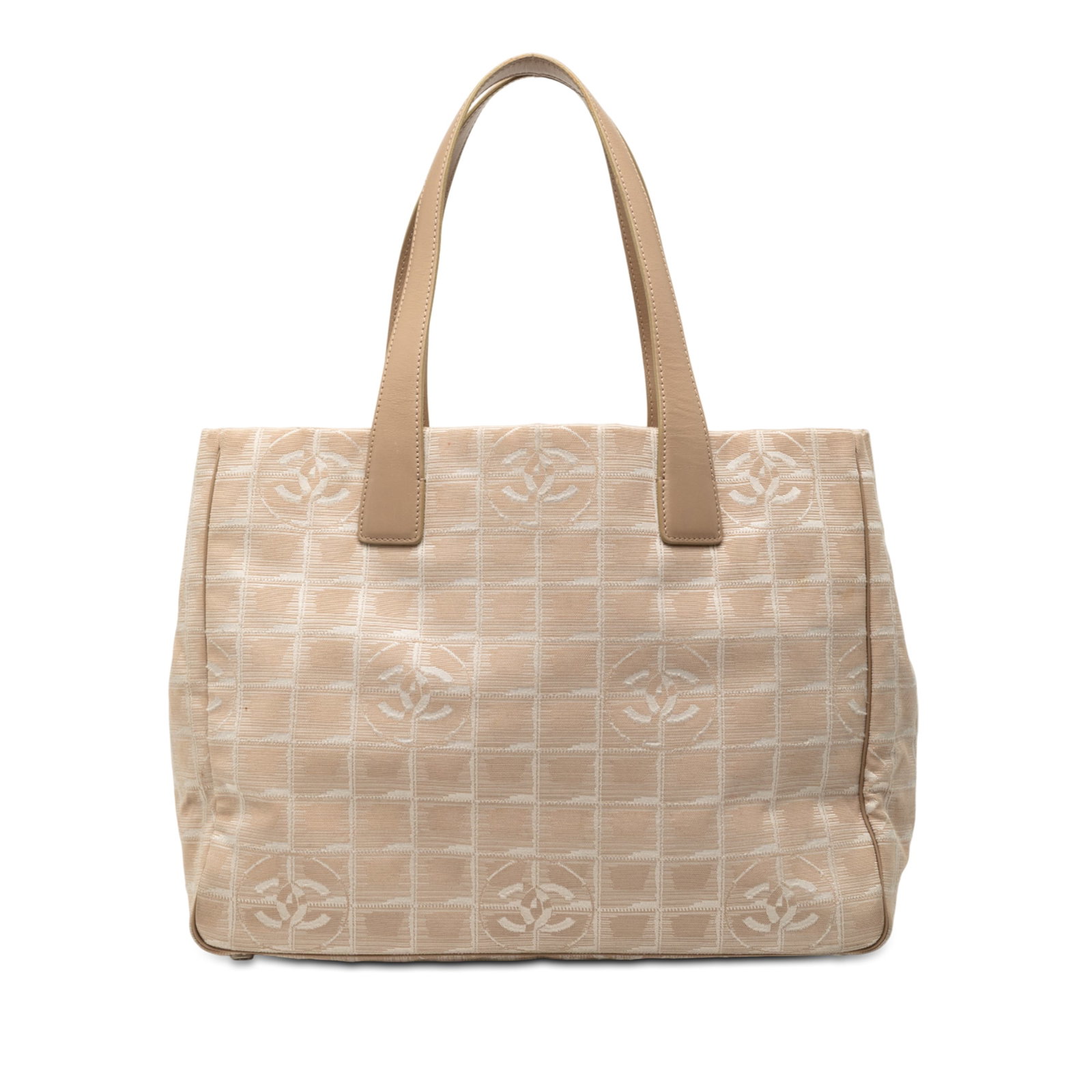 Chanel Brown New Travel Line Tote Bag in Nylon and Leather Trim: Chanel Brown New Travel Line Tote Bag in Nylon and Leather Trim This Chanel New Travel Line Nylon Tote features a nylon body with leather trim, flat leather straps, an open top design, and interior zi