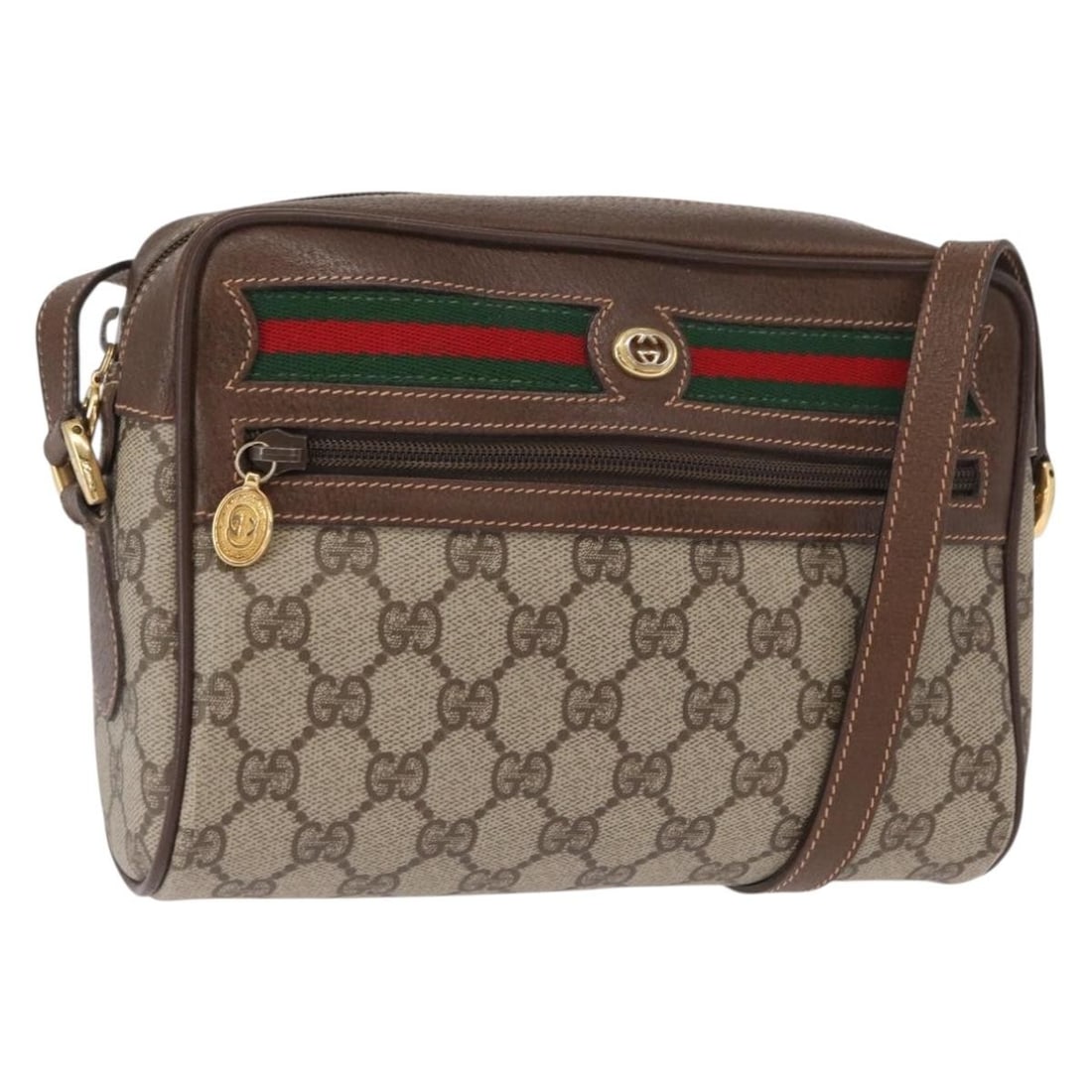 Beige GG Supreme Web Sherry Line Shoulder Bag by Gucci PVC Leather: Beige GG Supreme Web Sherry Line Shoulder Bag by Gucci PVC Leather This is a Gucci GG Supreme Web Sherry Line shoulder bag crafted in beige PVC leather and GG canvas. The bag features an adjustable sh