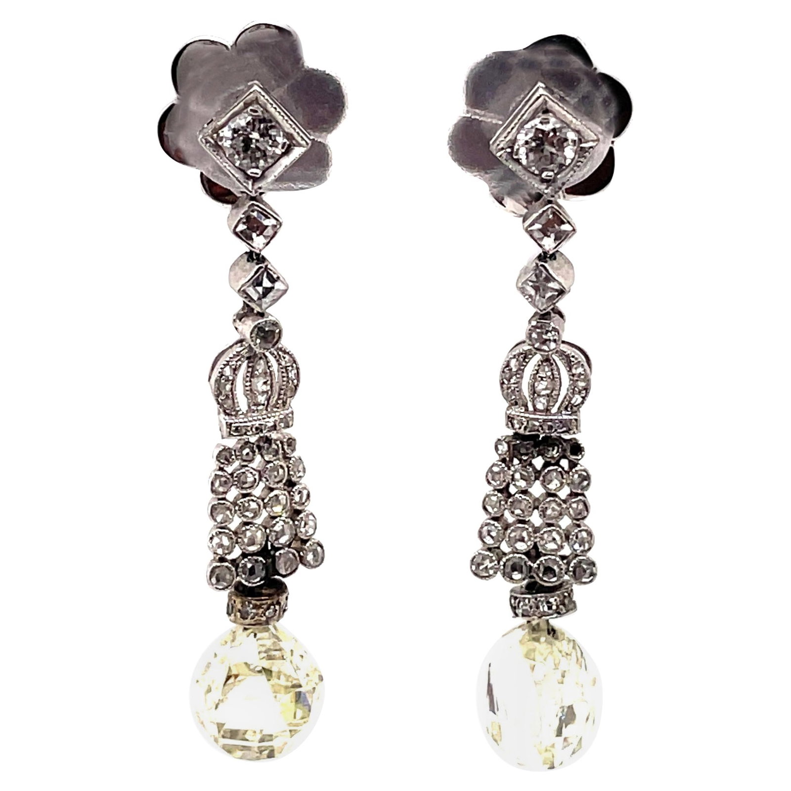 Edwardian Style Diamond Earrings 18k White Gold Briolette Cut: Edwardian Style Diamond Earrings 18k White Gold Briolette Cut These stunning Edwardian Style Briolette Diamond Earrings are crafted from 18k white gold, showcasing a captivating crown motif. Each earr