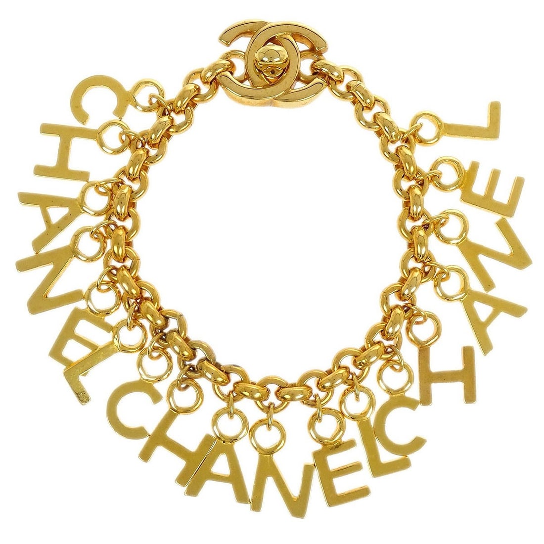 Gold Plated Bracelet with Turnlock Clasp by Chanel 96P: Gold Plated Bracelet with Turnlock Clasp by Chanel 96P This Chanel Turnlock bracelet features a distinctive gold-plated design, showcasing the brand's iconic style. Crafted with materials sourced from