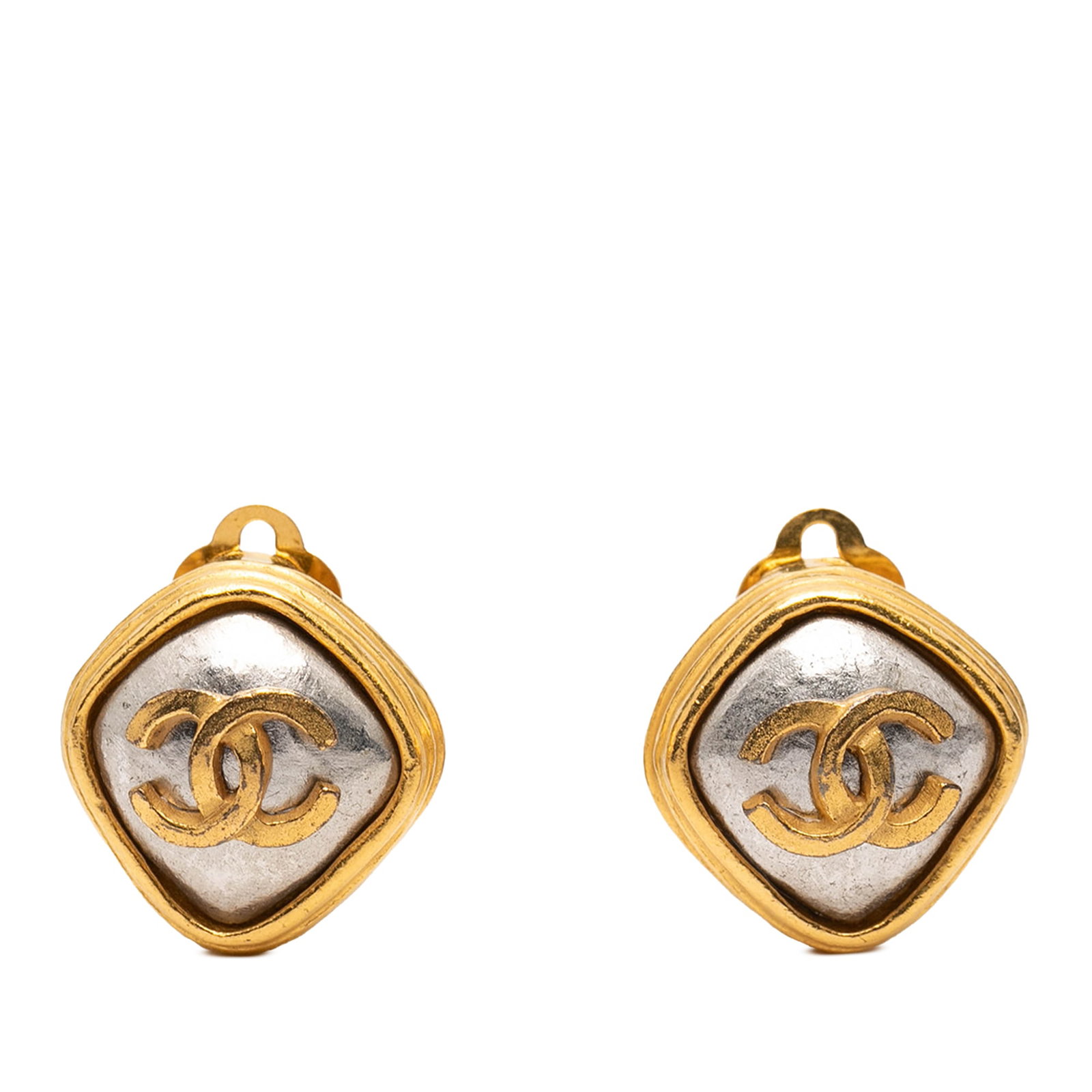 Chanel Diamond Shaped Gold Plated Clip On Earrings: Chanel Diamond Shaped Gold Plated Clip On Earrings These Chanel clip-on earrings feature a diamond-shaped design with a combination of gold-plated and silver-tone metal. Originating from France, they