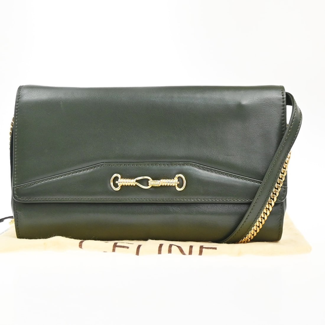 Green Leather Vintage Shoulder Bag by Celine Italy 25cm: Green Leather Vintage Shoulder Bag by Celine Italy 25cm This Celine vintage shoulder bag is crafted from green leather and designed for women. The bag features visible signs of wear, including scuffs,