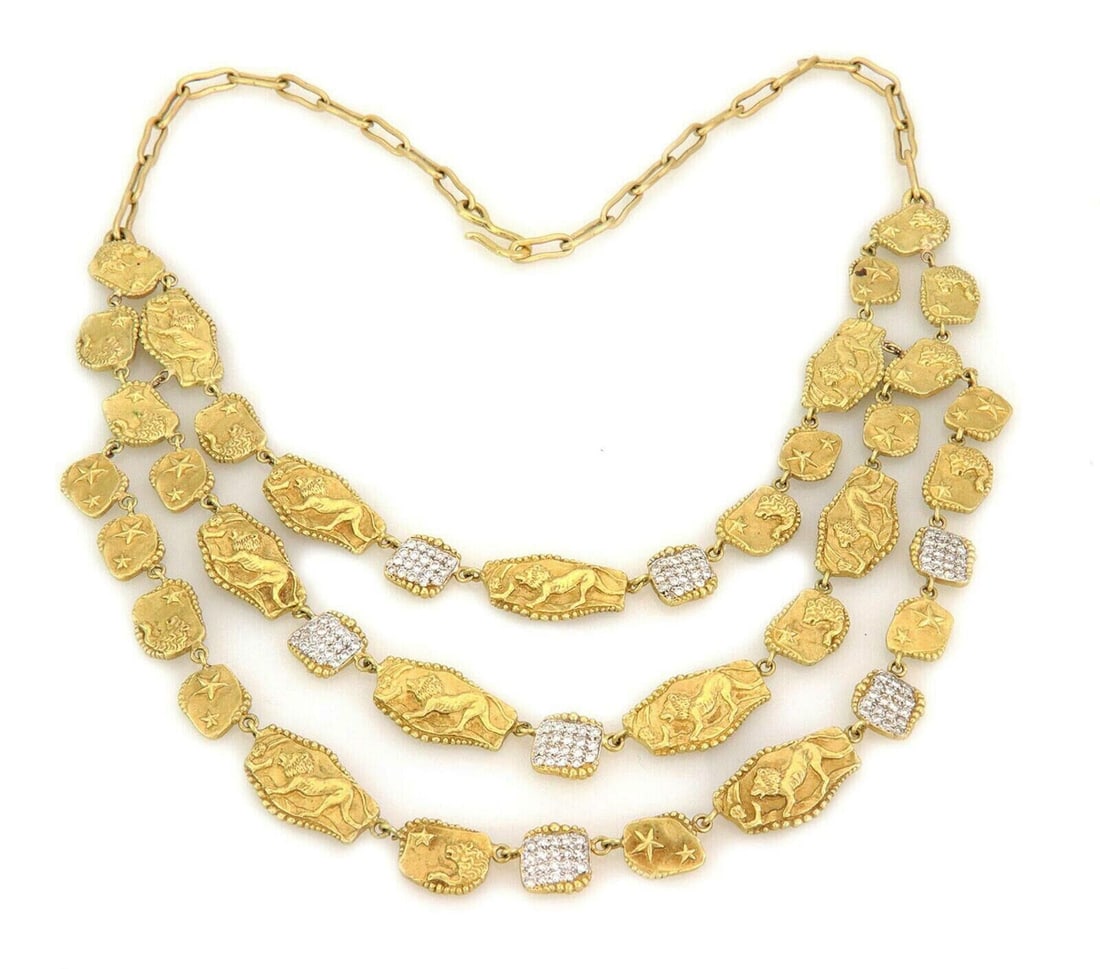 Athena Triple Strand Bib Necklace in 18k Gold with Diamond Lion Motifs by SeidenGang: Athena Triple Strand Bib Necklace in 18k Gold with Diamond Lion Motifs by SeidenGang This authentic SeidenGang Athena triple-strand bib necklace is crafted from solid 18k yellow gold and features the