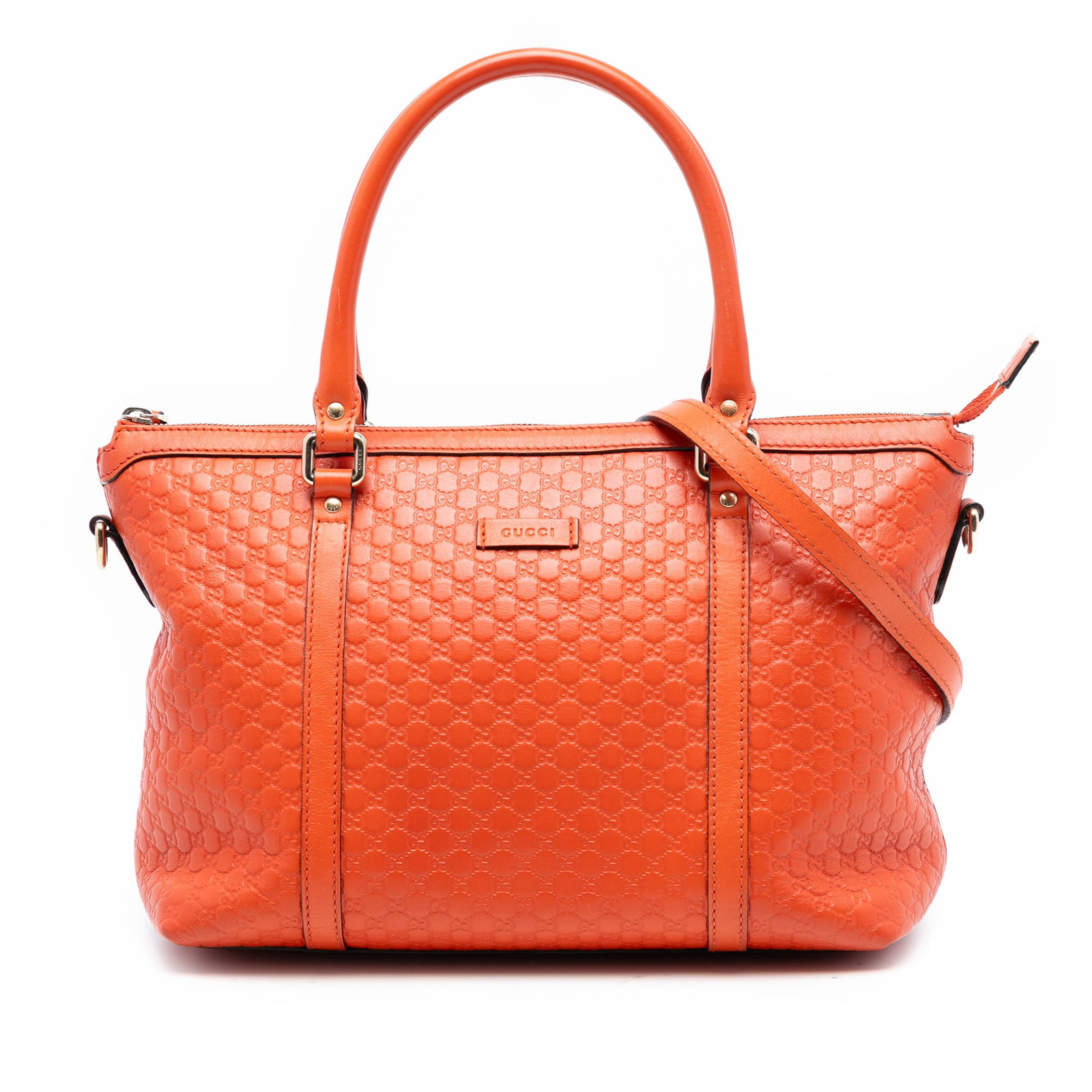 Orange Leather Satchel with Microguccissima Pattern and Detachable Strap by Gucci: Orange Leather Satchel with Microguccissima Pattern and Detachable Strap by Gucci This Gucci Small Microguccissima Joy Satchel features a leather body with rolled leather handles and a detachable flat