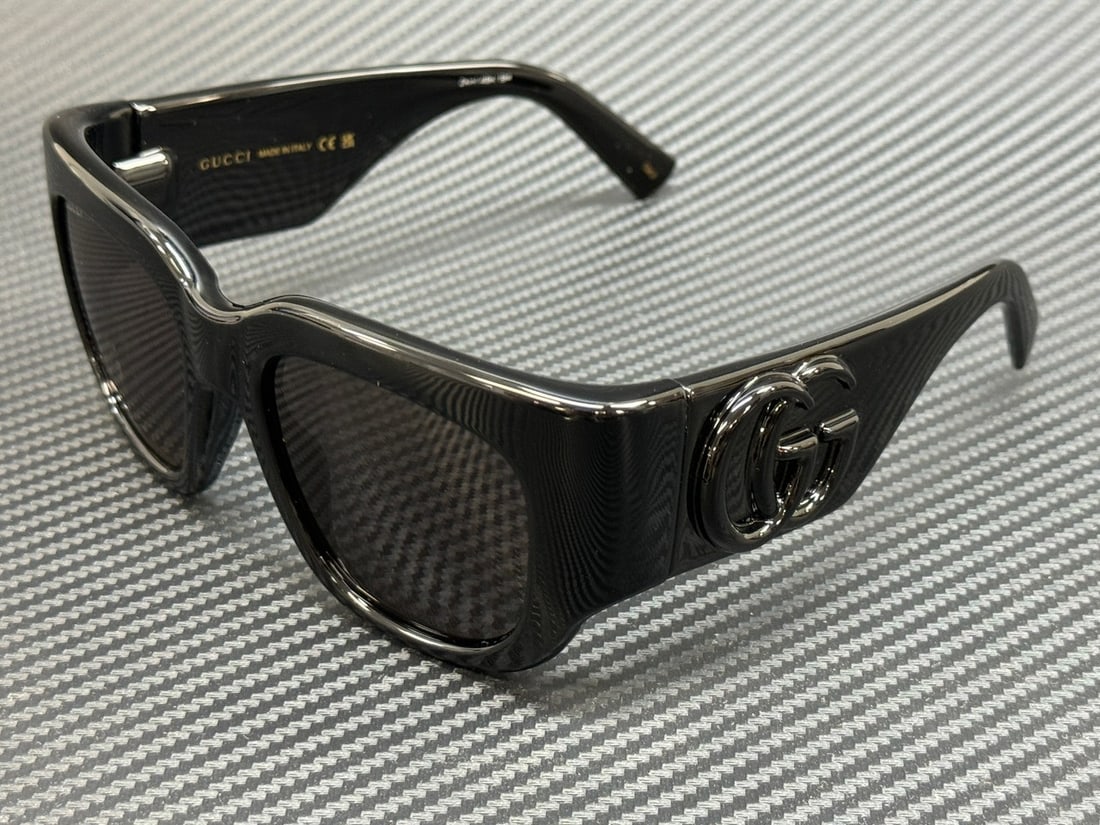 GUCCI GG1545S 001 Black Grey 53mm Women's Sunglasses with Authenticity: GUCCI GG1545S 001 Black Grey 53mm Women's Sunglasses with Authenticity Elevate your style with these GUCCI GG1545S 001 sunglasses, designed for the modern woman. Featuring a sleek black frame and chic