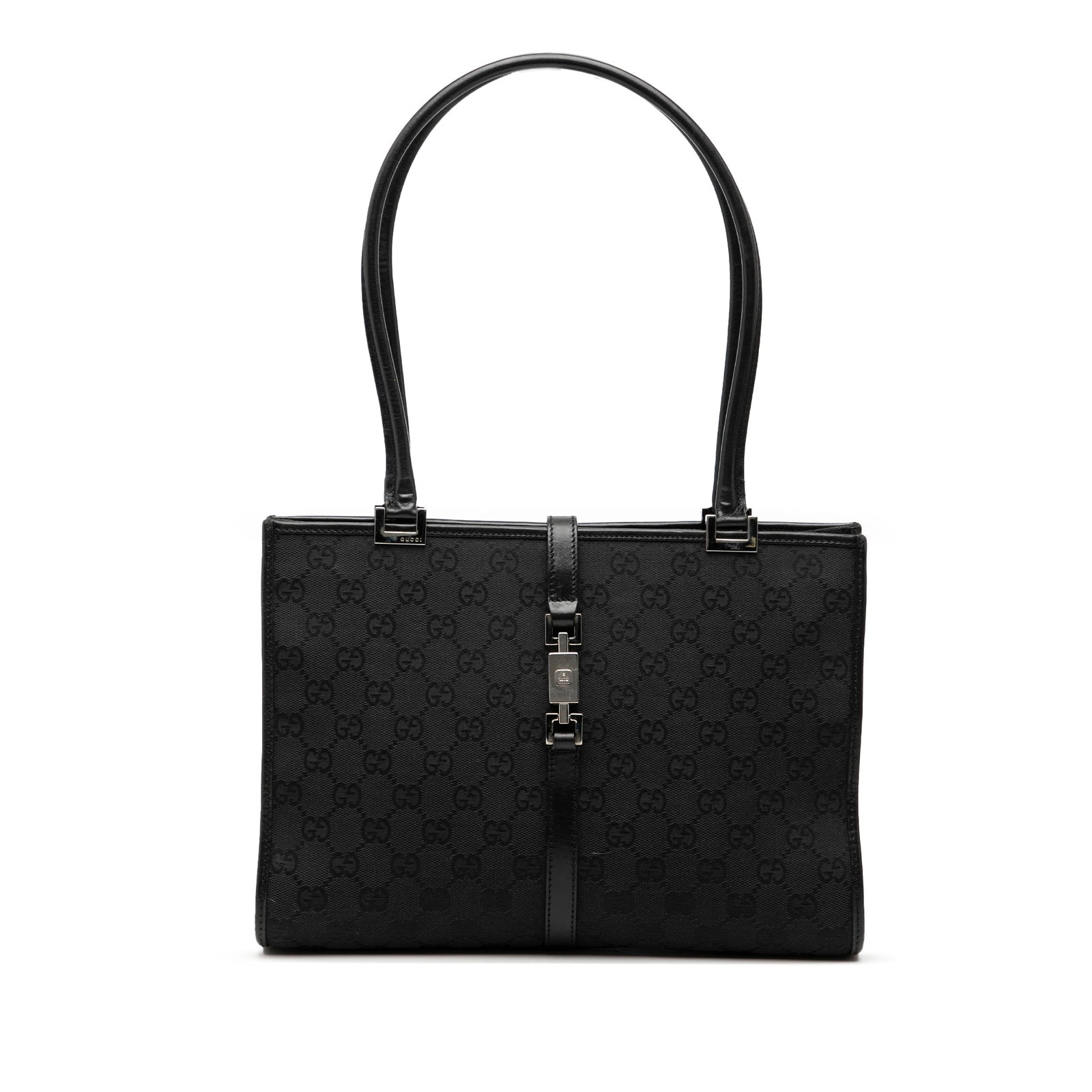 Gucci Jackie Black Canvas Tote Bag with Leather Handles: Gucci Jackie Black Canvas Tote Bag with Leather Handles This Gucci GG Canvas Jackie Tote features a black canvas body with rolled leather handles and an open top secured by a strap and push lock closu