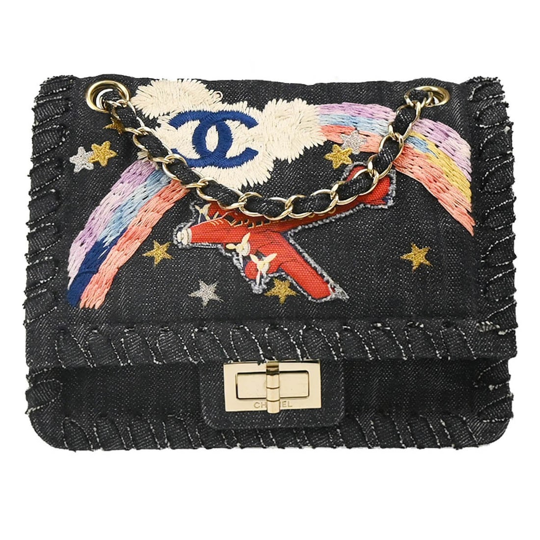 Chanel Indigo Denim Night Flight Shoulder Bag with Lock Logo: Chanel Indigo Denim Night Flight Shoulder Bag with Lock Logo Introducing the Chanel Indigo Denim Night Flight Mademoiselle Lock Shoulder Bag, a stylish accessory crafted in Italy. This small, elegant