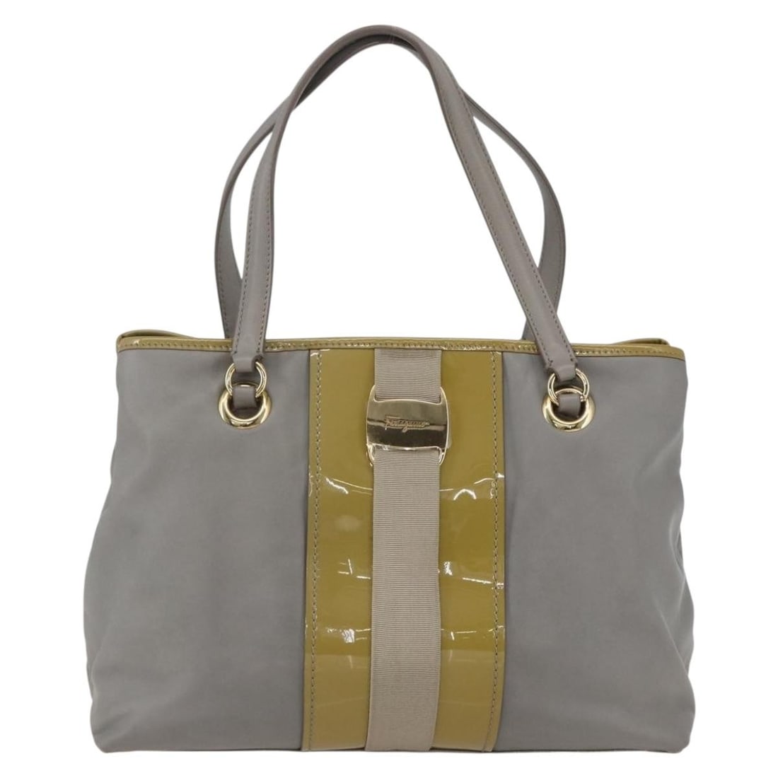 Vala Tote Bag by Salvatore Ferragamo in Gray Leather: Vala Tote Bag by Salvatore Ferragamo in Gray Leather This Salvatore Ferragamo Vala tote is crafted from gray leather and designed for women. Made in Italy, the bag features a spacious interior and an