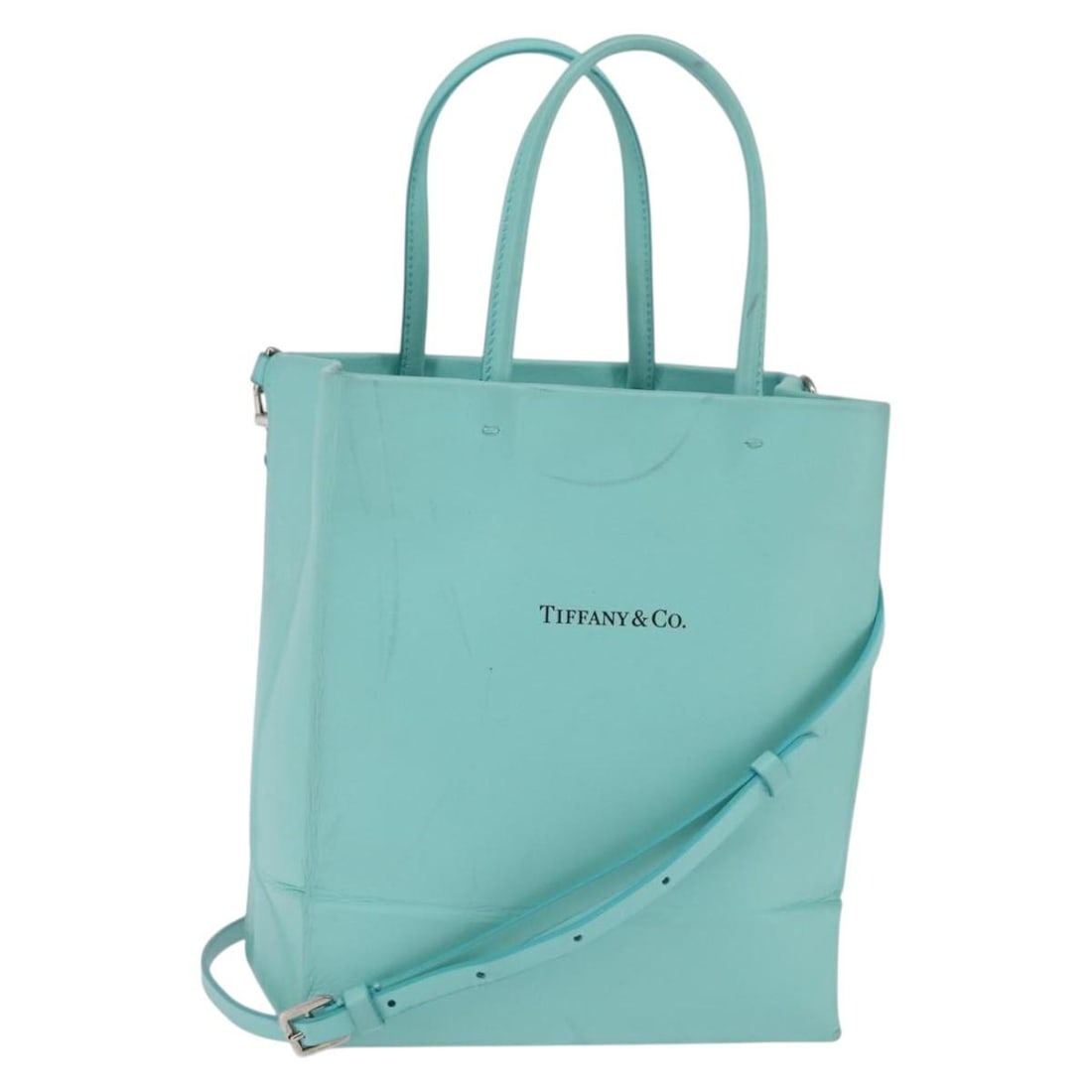 Tiffany & Co. Leather Hand Bag Turquoise Blue Silver Auth 145520: Tiffany & Co. Leather Hand Bag Turquoise Blue Silver Auth 145520 This stunning Tiffany & Co. handbag is crafted from high-quality leather in a beautiful turquoise blue and silver color combination. Th