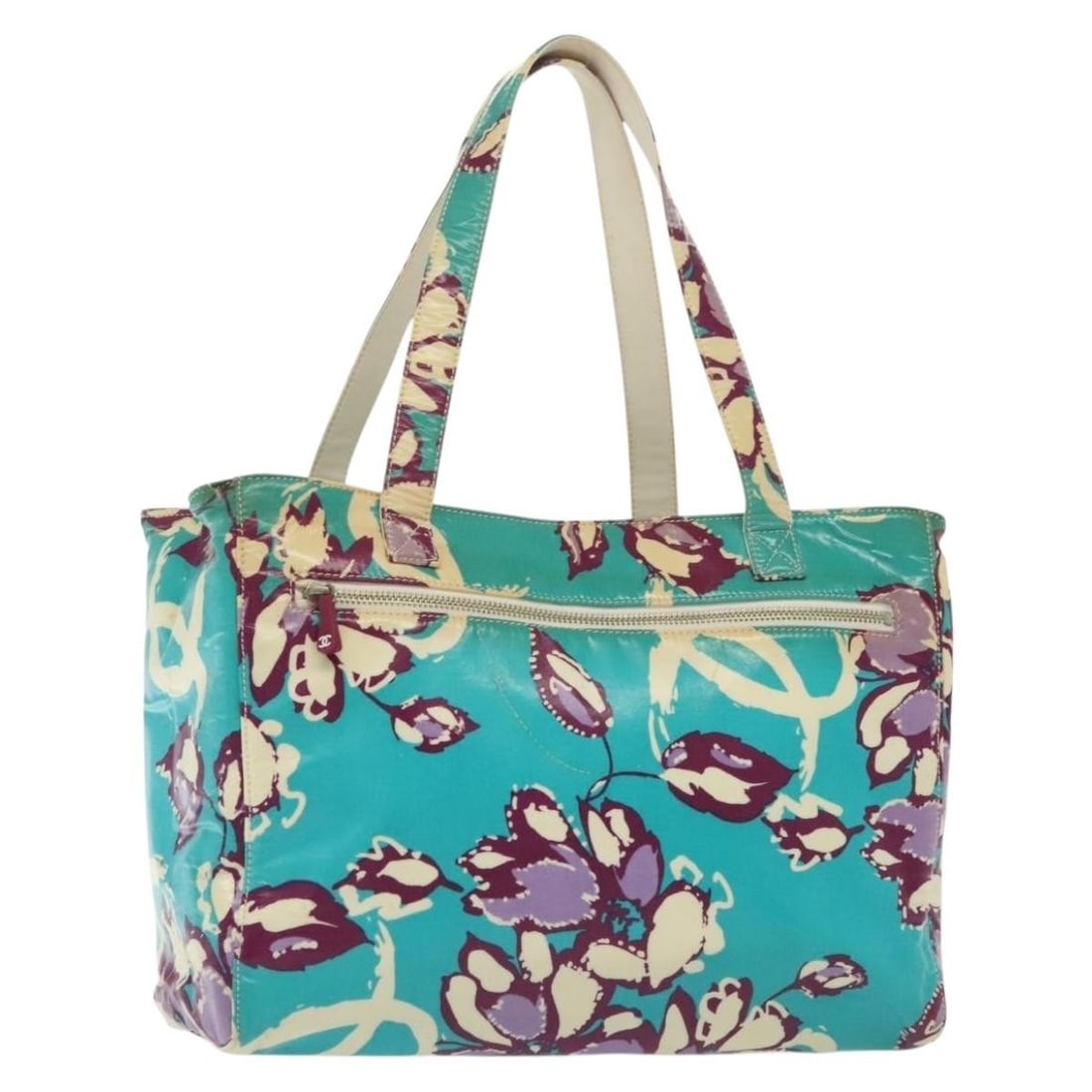 Chanel Blue Vintage Floral Pattern Tote Plastic Bag: Chanel Blue Vintage Floral Pattern Tote Plastic Bag This Chanel Vintage Floral Tote features a blue plastic exterior with floral details and is designed for women. The bag shows signs of wear, includi