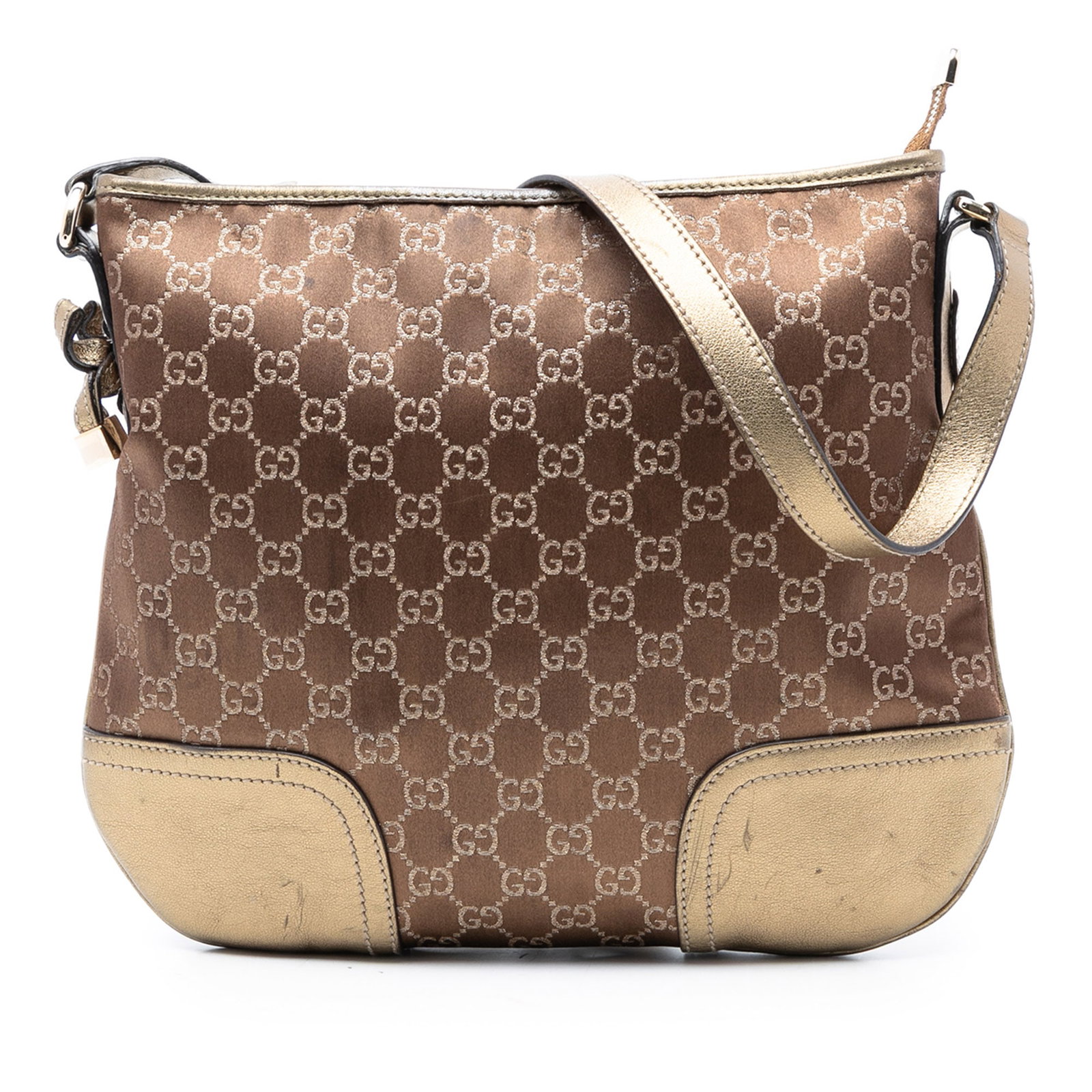 GG Canvas Princy Brown Crossbody Bag with Leather Trim by Gucci: GG Canvas Princy Brown Crossbody Bag with Leather Trim by Gucci This Gucci GG Canvas Princy Crossbody bag features a durable canvas body complemented by leather trim and an adjustable flat leather str