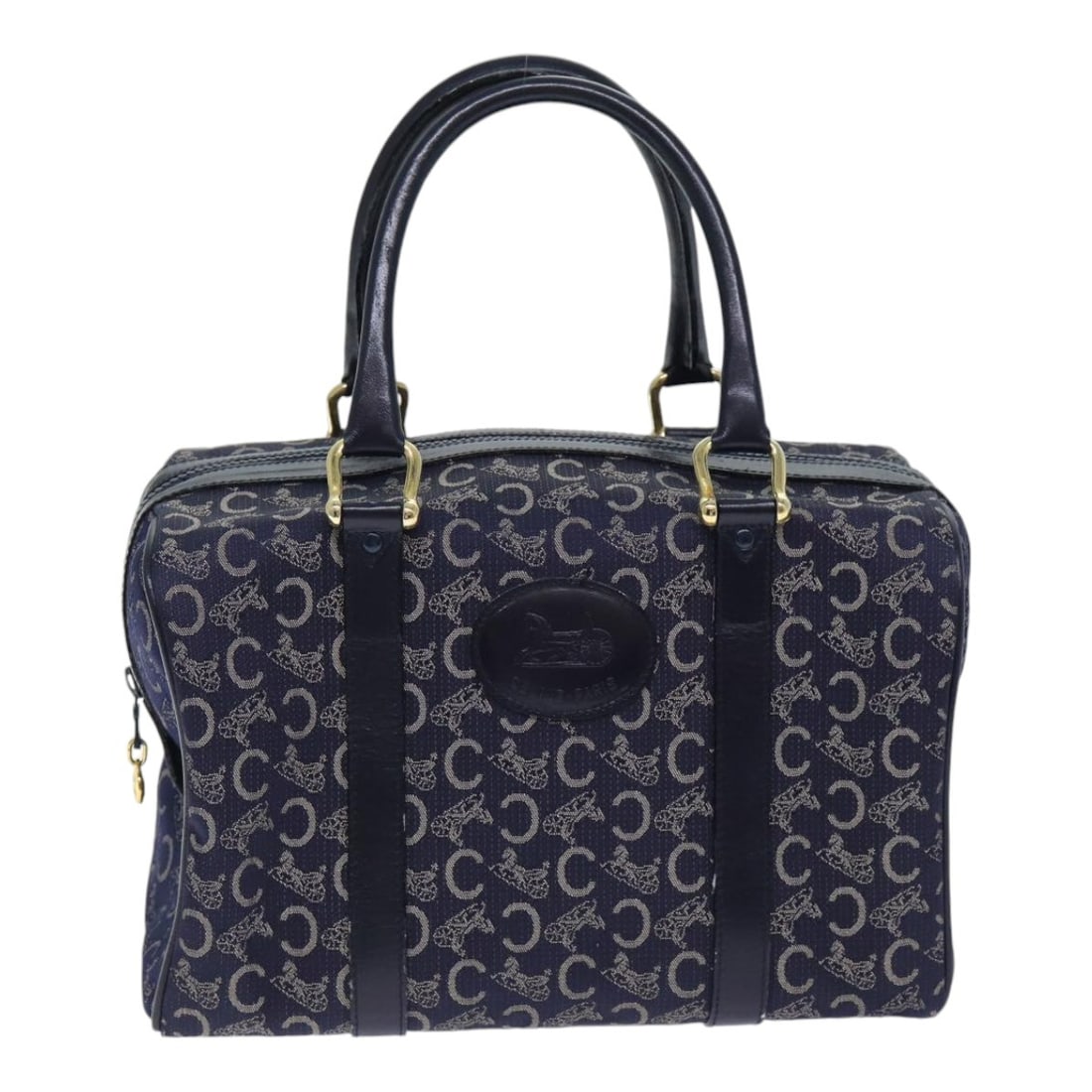Navy Canvas Celine C Sulky Boston Bag 28.5cm x 18.5cm x 17.5cm: Navy Canvas Celine C Sulky Boston Bag 28.5cm x 18.5cm x 17.5cm This Celine C Sulky Boston bag is crafted from navy canvas with leather accents, designed for women. It features metal fittings and a str