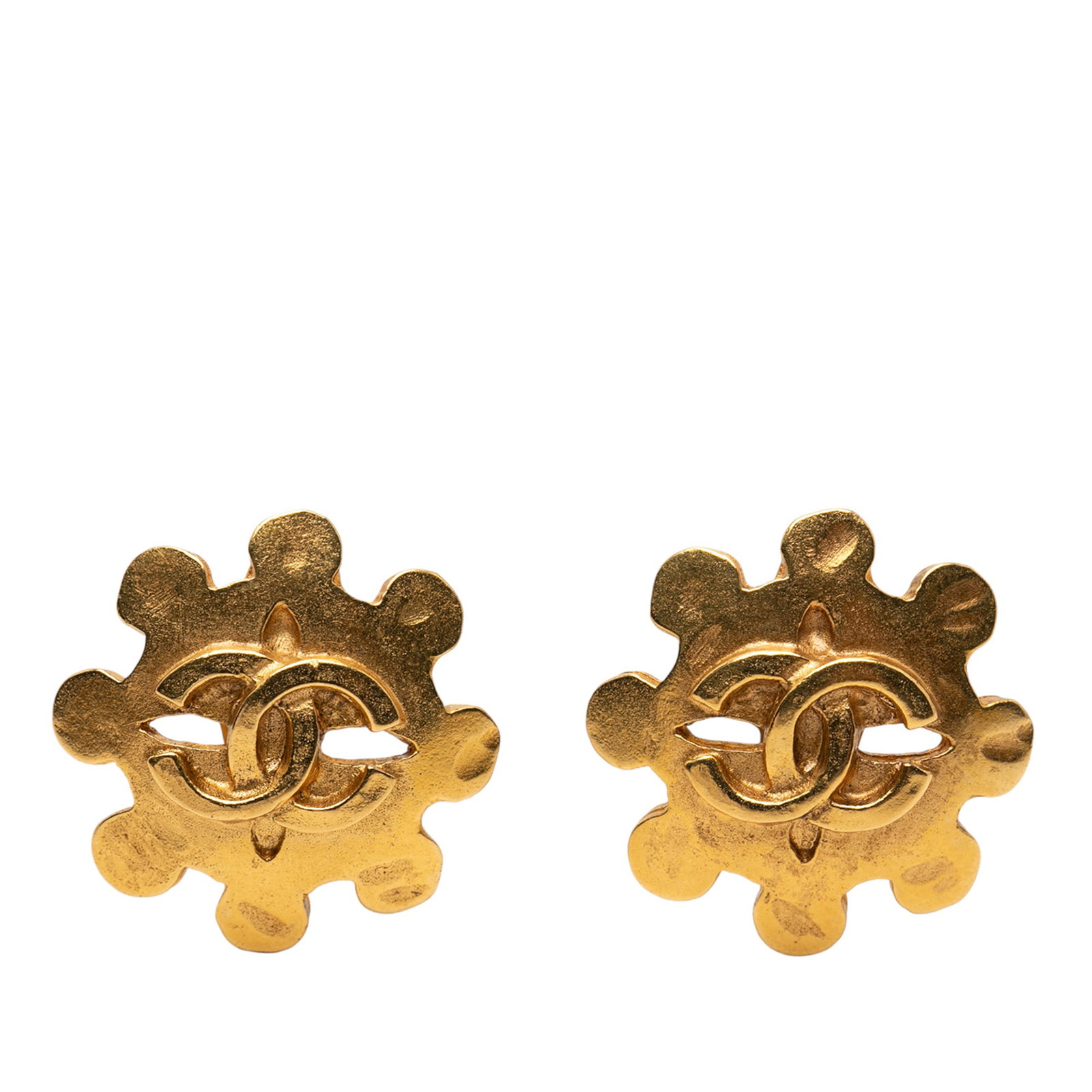 Chanel Flower Motif Gold Plated Metal Clip On Earrings: Chanel Flower Motif Gold Plated Metal Clip On Earrings These Chanel earrings feature a gold-plated metal body designed in the shape of a flower with clip-on closures. Made in France, they are categori
