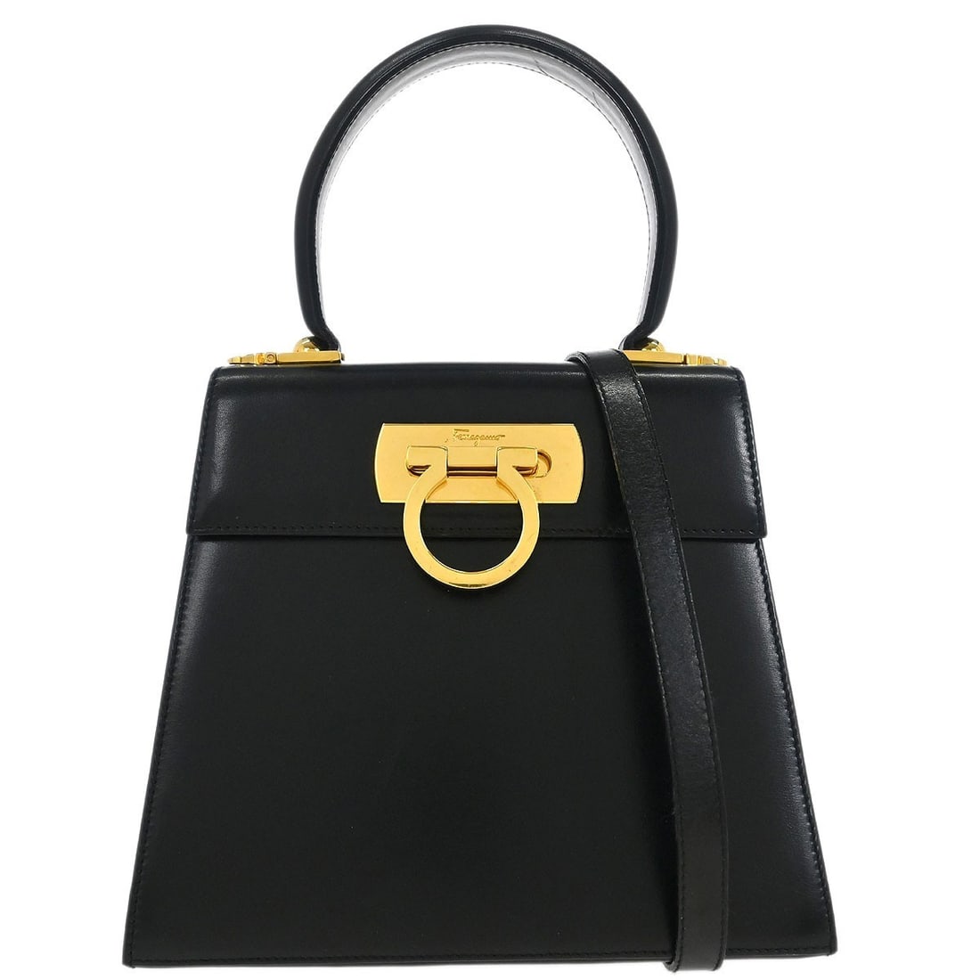 Black Leather Salvatore Ferragamo Gancini Convertible Handbag: Black Leather Salvatore Ferragamo Gancini Convertible Handbag This pre-owned Salvatore Ferragamo Convertible Top Handle Bag is crafted from black leather and designed for women. It features the signat