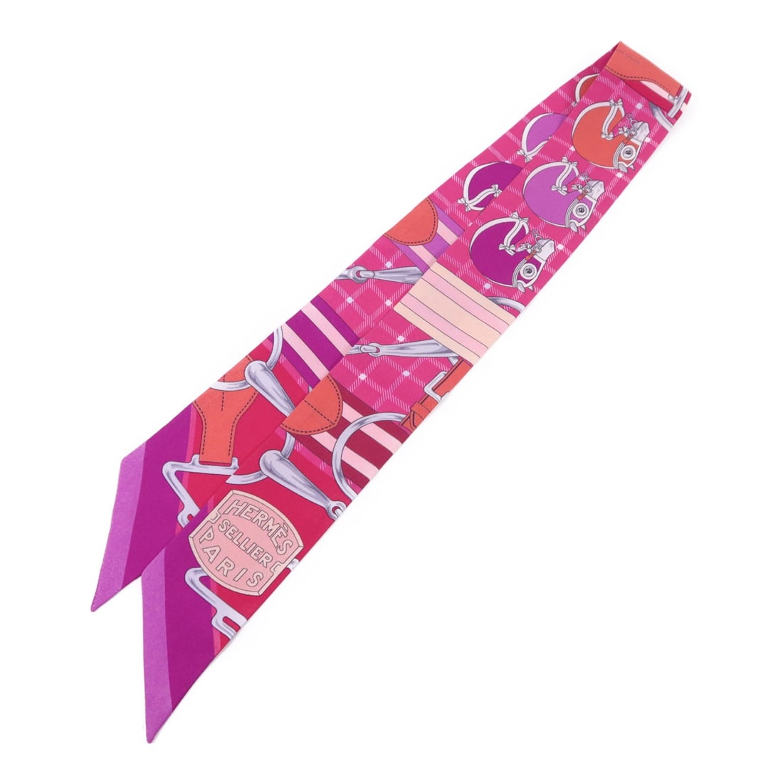 Silk Multicolor Twilly Scarf by Hermes France: Silk Multicolor Twilly Scarf by Hermes France This Hermes Twilly scarf is crafted from luxurious silk and features a vibrant multicolor design. Made in France, it is a stylish accessory suitable for a