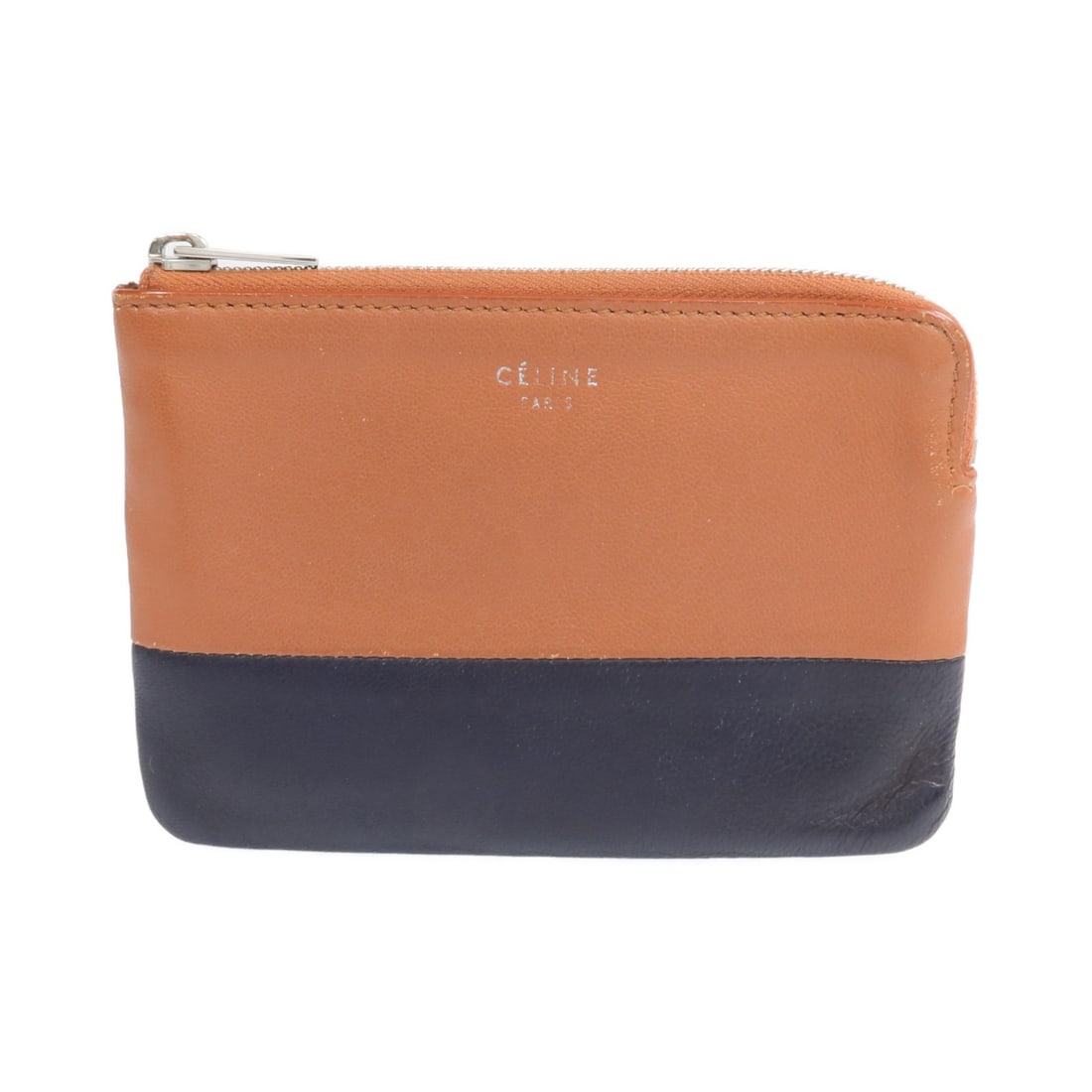Celine Calfskin Leather Brown and Black Coin Purse with Silver Hardware: Celine Calfskin Leather Brown and Black Coin Purse with Silver Hardware This CELINE coin purse features a brown and black design crafted from calfskin leather. Made in France, it offers a stylish and