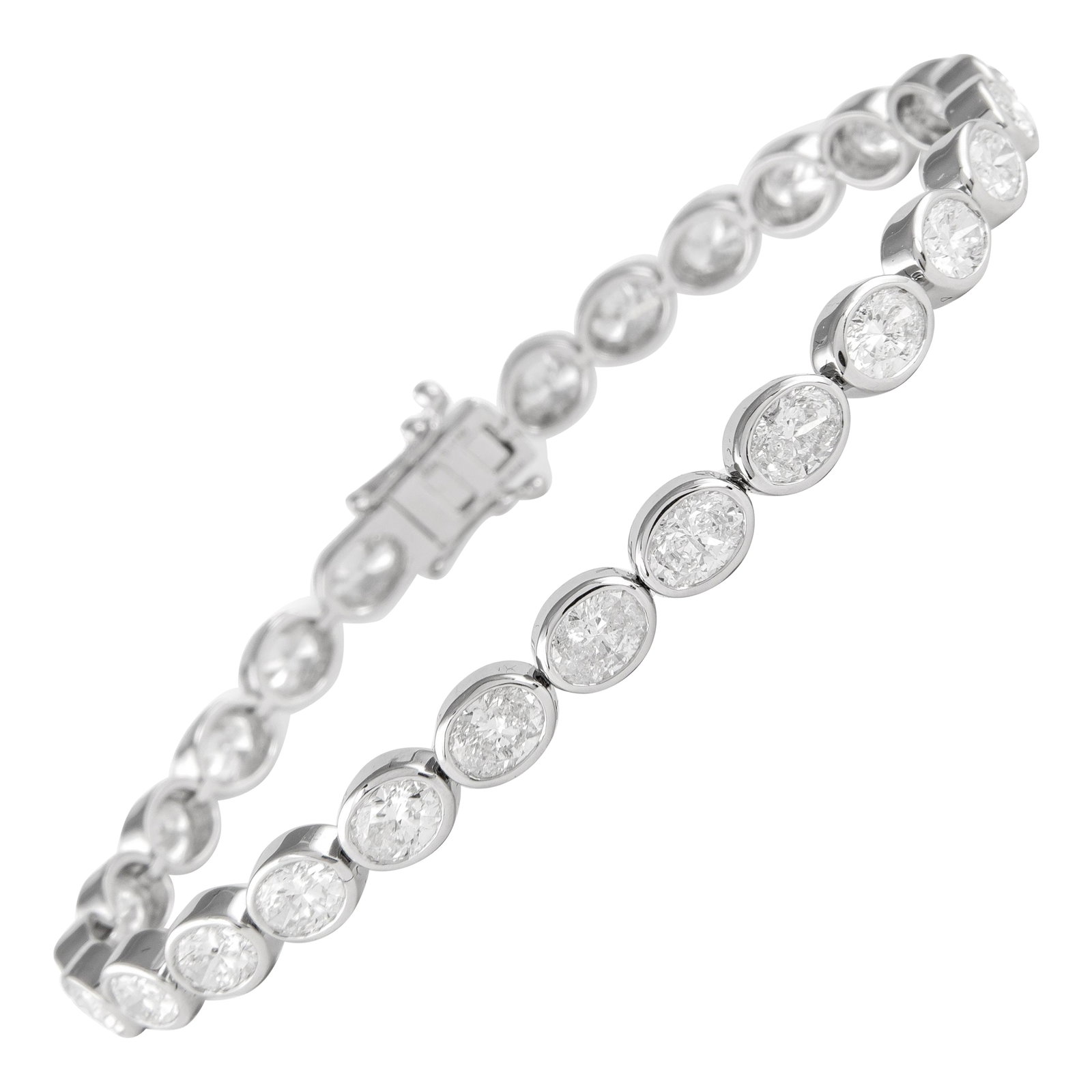 8.51ct Oval Diamond Tennis Bracelet 18k White Gold: 8.51ct Oval Diamond Tennis Bracelet 18k White Gold This stunning contemporary tennis bracelet features 27 oval-cut diamonds, totaling 8.51 carats, elegantly set in a modern east-west bezel design. Cra