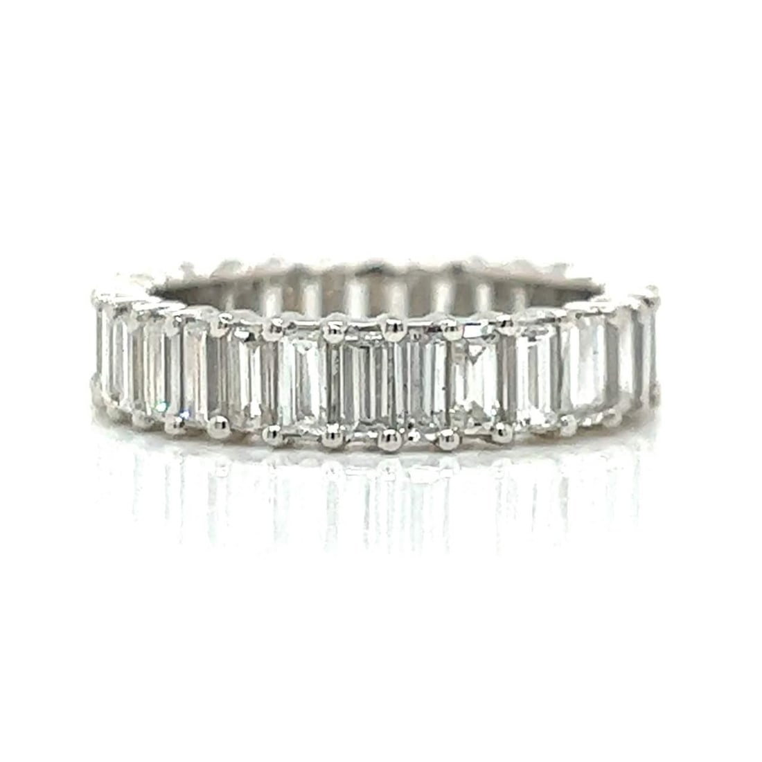 Stunning Platinum Eternity Band with 36 Baguette Diamonds 3.75 Ct: Stunning Platinum Eternity Band with 36 Baguette Diamonds 3.75 Ct This exquisite Platinum Eternity Band features a stunning collection of 36 Baguette Diamonds, with a total weight of approximately 3.7