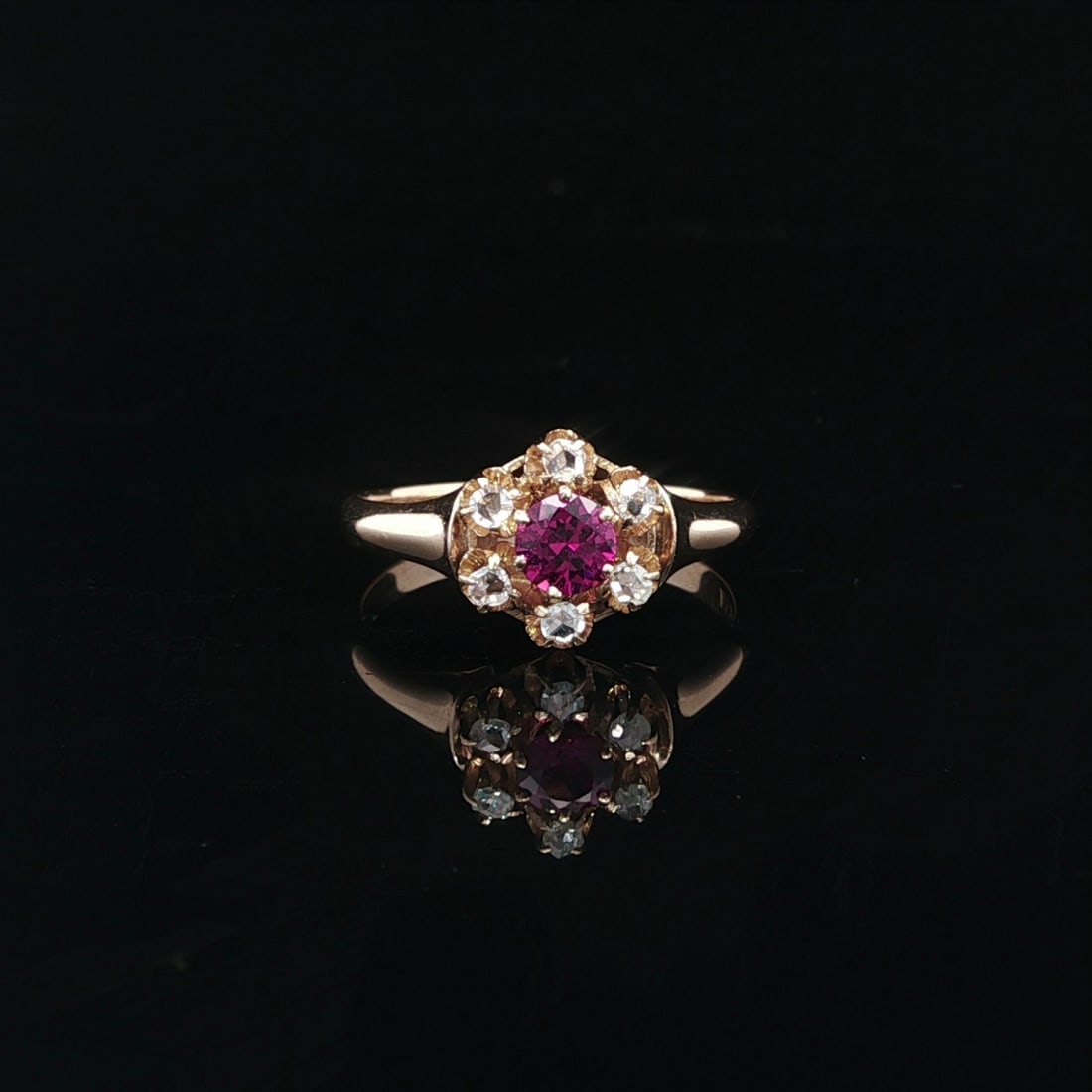 Antique Victorian 10k Yellow Gold Purple Stone Diamond Halo Cluster Ring: Antique Victorian 10k Yellow Gold Purple Stone Diamond Halo Cluster Ring This exquisite Antique Victorian ring showcases a beautiful flower cluster design featuring a vivid rich purple stone at its ce