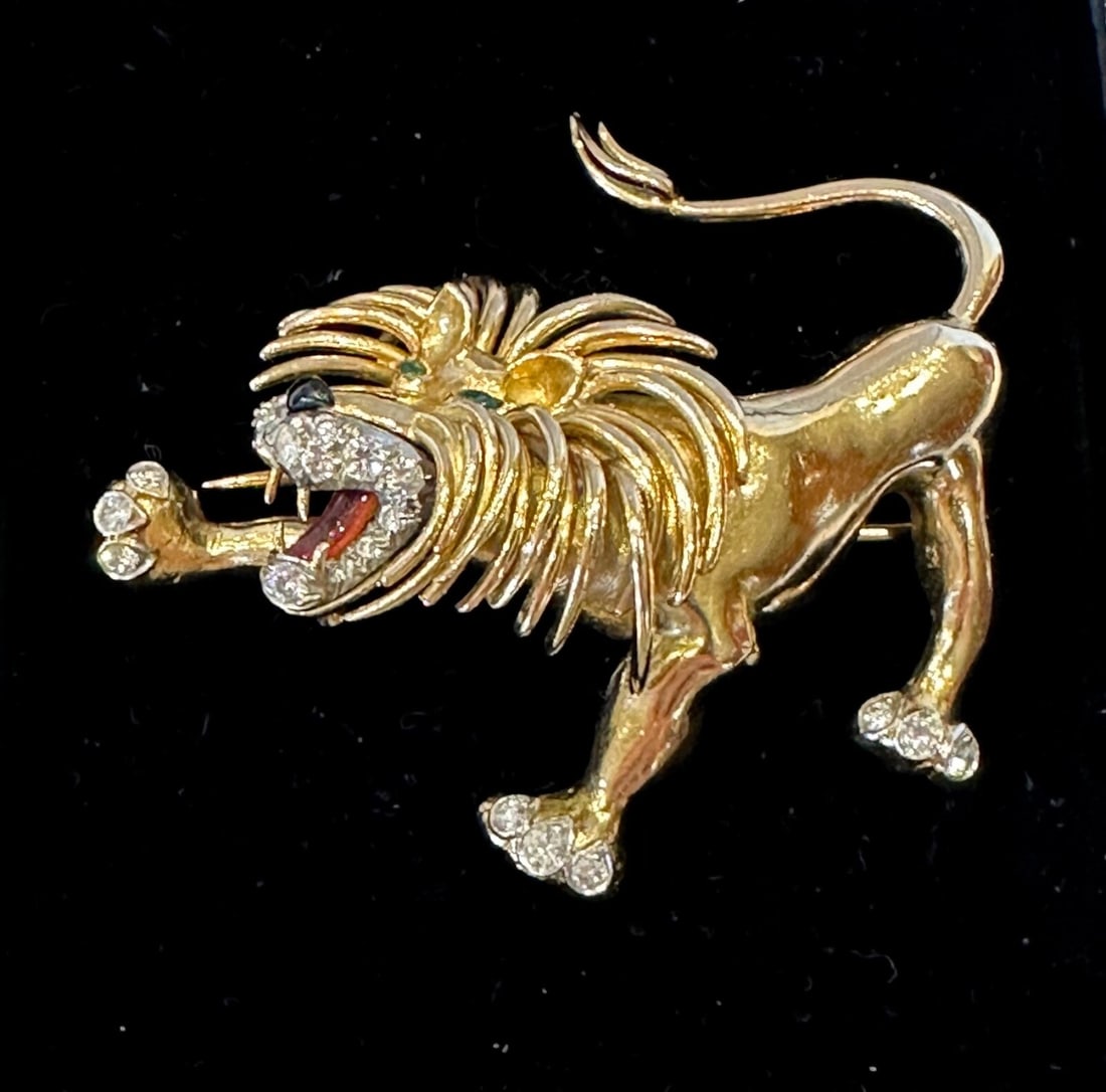 French 18K Gold Platinum Diamond Emerald Enamel Lion Brooch: French 18K Gold Platinum Diamond Emerald Enamel Lion Brooch Discover the elegance of this exquisite French brooch, crafted from a luxurious blend of 18k yellow and white gold with platinum accents. Th