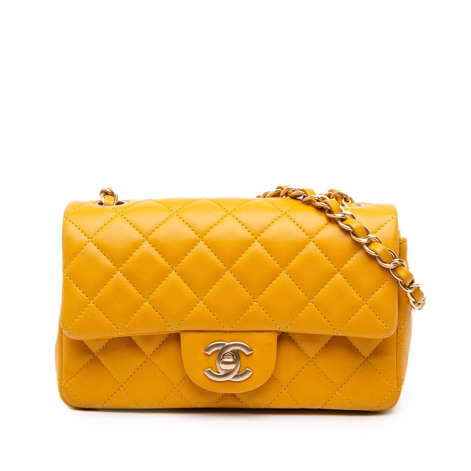 Chanel Mini Rectangular Classic Flap Yellow Lambskin Bag: Chanel Mini Rectangular Classic Flap Yellow Lambskin Bag Introducing the Chanel Mini Rectangular Classic Lambskin Single Flap, a timeless accessory crafted from luxurious quilted lambskin leather. Thi