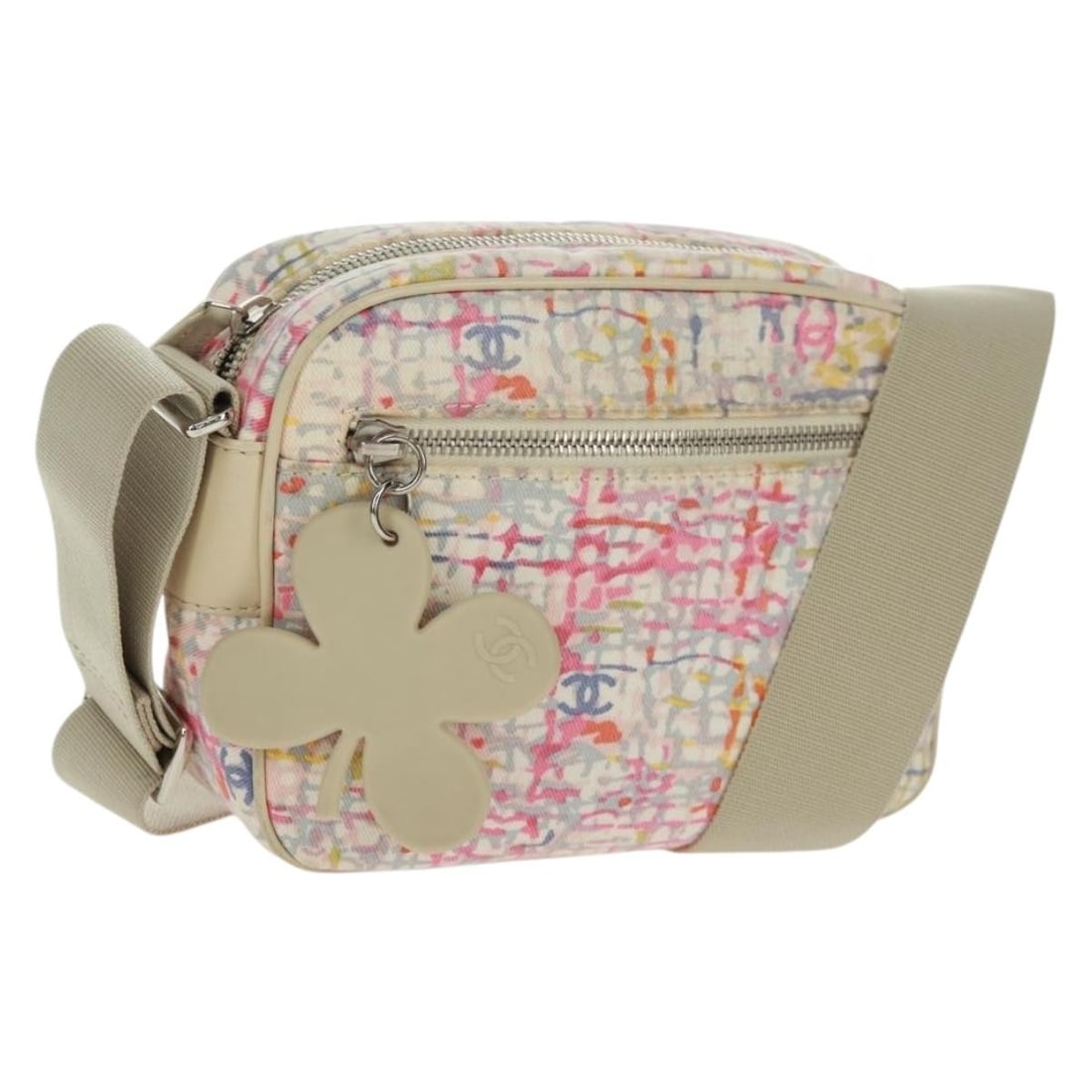 CHANEL Multicolor Canvas Shoulder Bag with Silver Tone CC Logo: CHANEL Multicolor Canvas Shoulder Bag with Silver Tone CC Logo This CHANEL shoulder bag is crafted from multicolor canvas with silver-tone accents. Designed for women, it features an adjustable strap