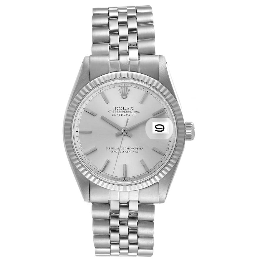 Rolex Datejust Mens Watch Reference 1601/4 with Silver Stick Dial Jubilee Bracelet: Rolex Datejust Mens Watch Reference 1601/4 with Silver Stick Dial Jubilee Bracelet This Rolex Datejust watch features a silver stick dial and a fluted bezel, paired with a Jubilee bracelet. It is desi