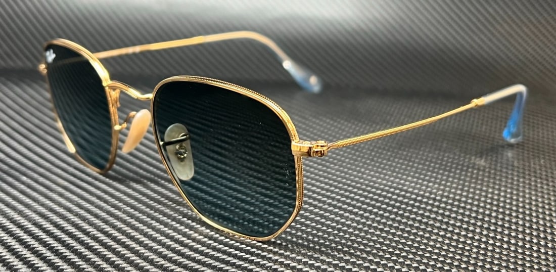 Ray-Ban RB3548N 91233M Arista Hexagonal Blue Gradient Sunglasses: Ray-Ban RB3548N 91233M Arista Hexagonal Blue Gradient Sunglasses These Ray-Ban RB3548N 91233M Arista Hexagonal sunglasses combine a stylish geometric design with high-quality materials for an exceptio