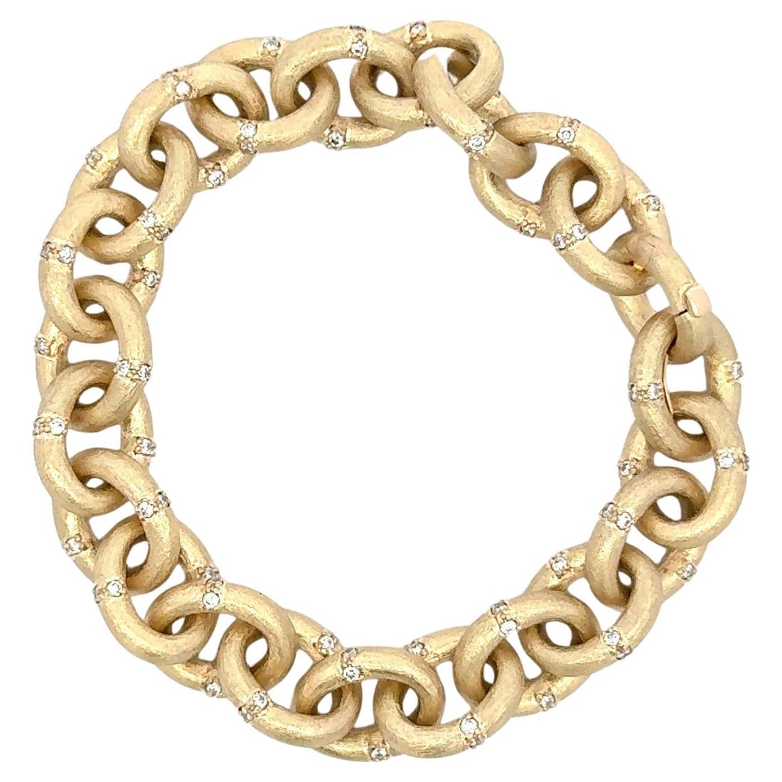 Italian 14K Yellow Gold Diamond Link Bracelet 1.32 Carats Matte Finish: Italian 14K Yellow Gold Diamond Link Bracelet 1.32 Carats Matte Finish This exquisite Italian link bracelet is crafted from 14 karat yellow gold and features a contemporary design. Each link is adorne