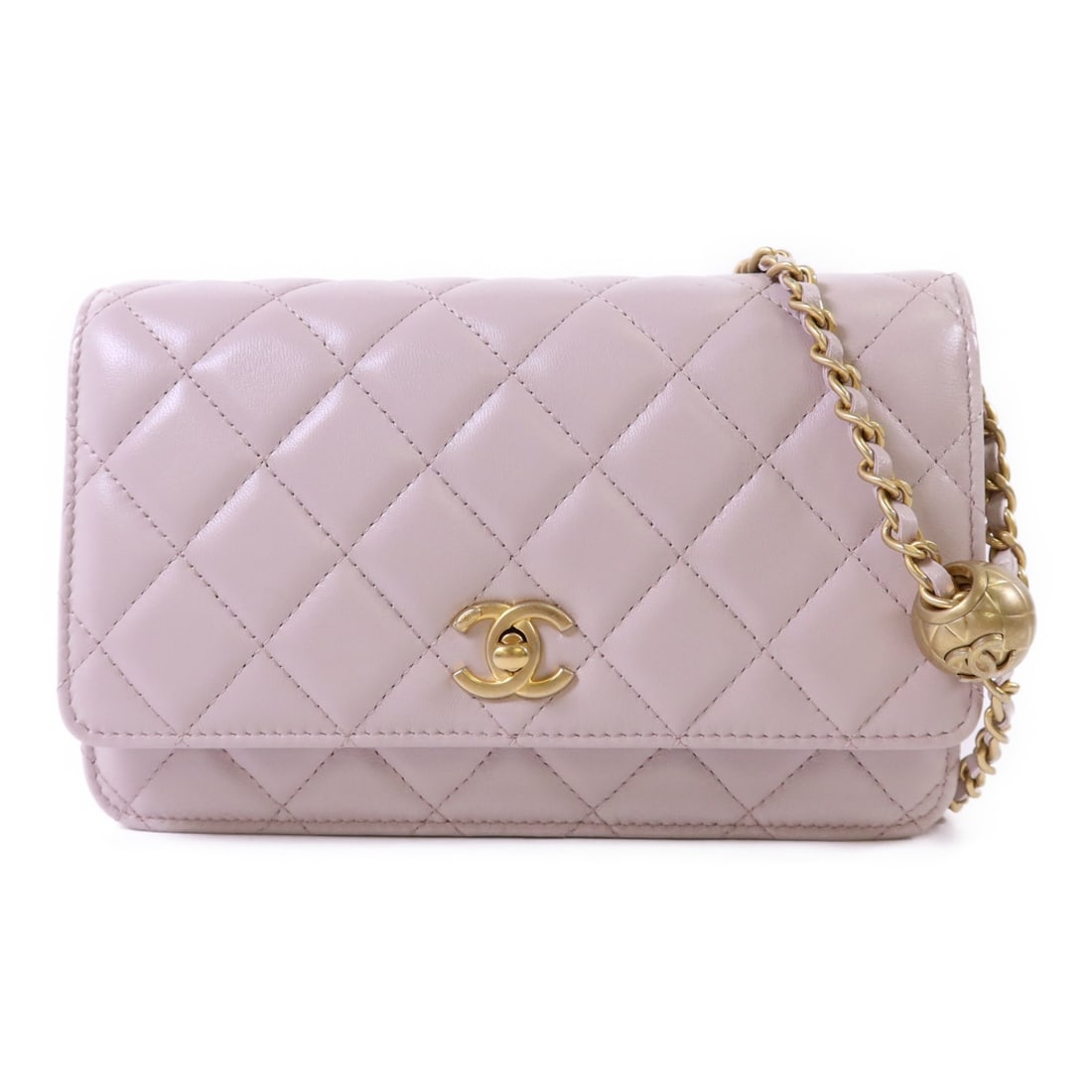 Chanel Pink Lambskin Wallet On Chain Shoulder Bag with CC Gold Hardware: Chanel Pink Lambskin Wallet On Chain Shoulder Bag with CC Gold Hardware This CHANEL Wallet On Chain (WOC) shoulder bag is crafted from luxurious pink lambskin leather. Featuring the iconic CC detail,