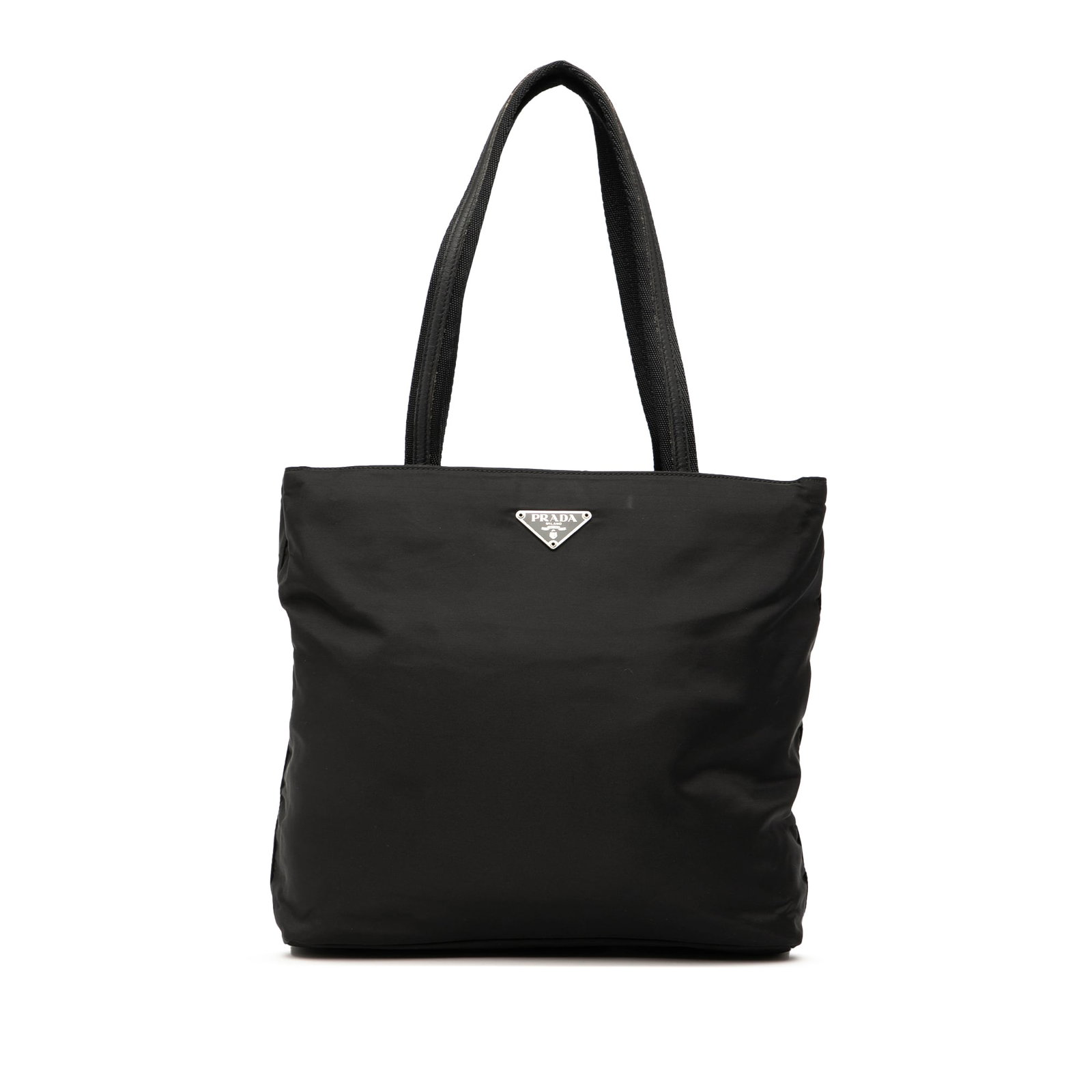 Black Prada Tessuto Nylon Tote Bag with Leather Handles: Black Prada Tessuto Nylon Tote Bag with Leather Handles This Prada Tessuto Tote features a black nylon body with flat leather handles and a top zip closure. The bag includes both interior zip and slip