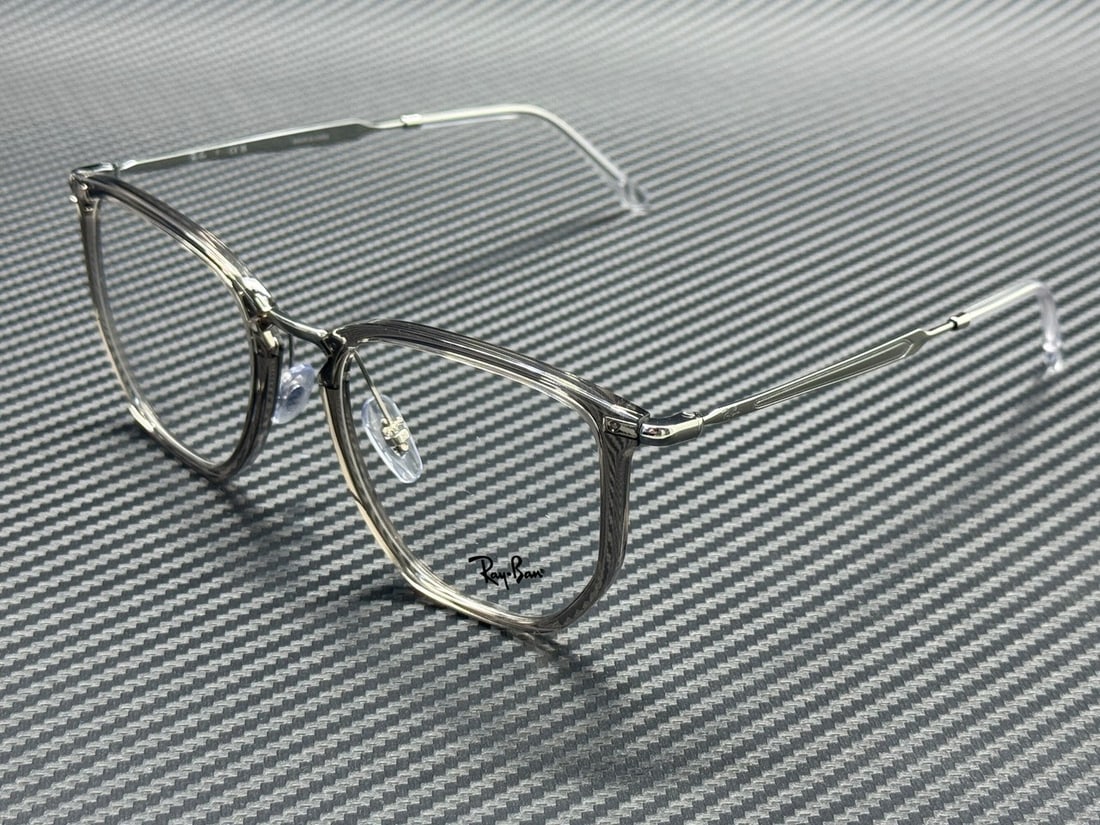 Ray-Ban RX4451V 8125 Transparent Gray Unisex 53mm Optical Frames: Ray-Ban RX4451V 8125 Transparent Gray Unisex 53mm Optical Frames These Ray-Ban RX4451V 8125 eyeglasses feature a transparent grey frame and are designed for unisex wear. They include demo lenses and c