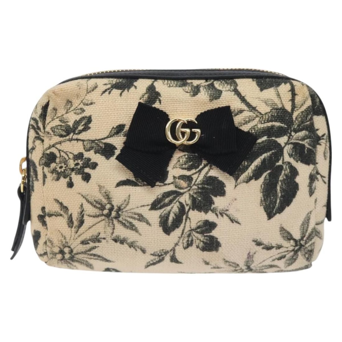 Beige Canvas GG Marmont Pouch by Gucci for Women: Beige Canvas GG Marmont Pouch by Gucci for Women The Gucci GG Marmont Pouch is crafted from beige coated canvas and designed for women. Made in Italy, this pouch features minor signs of use, including
