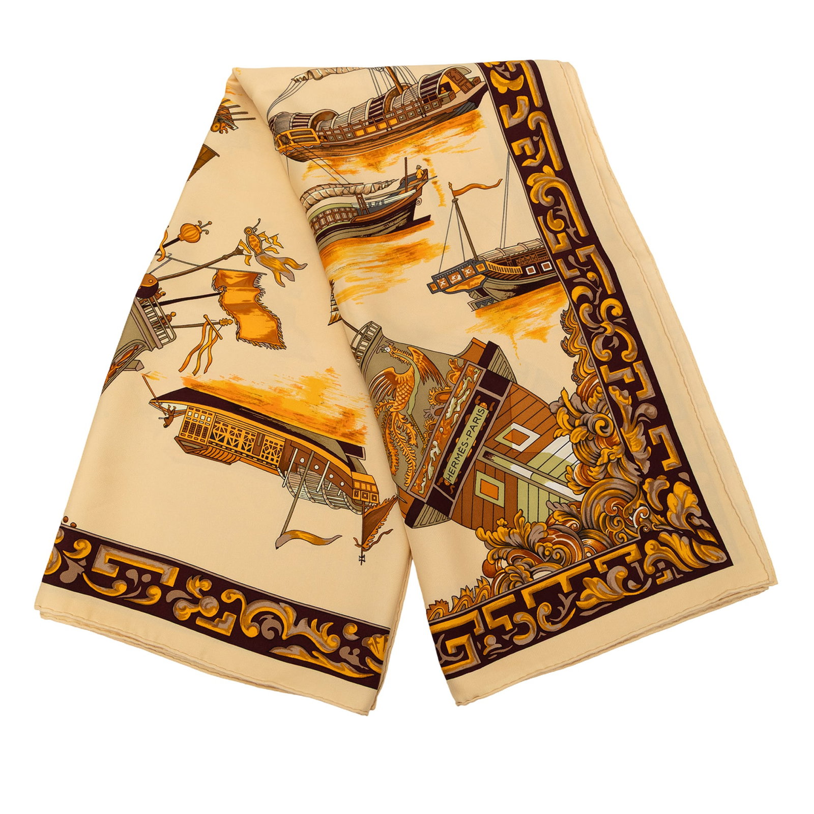 Jonques Et Sampans Orange Silk Scarf by Hermes: Jonques Et Sampans Orange Silk Scarf by Hermes This Hermes scarf showcases the Jonques Et Sampans design in vibrant orange on 100% silk. Crafted in France, it is a stylish accessory featuring a luxuri