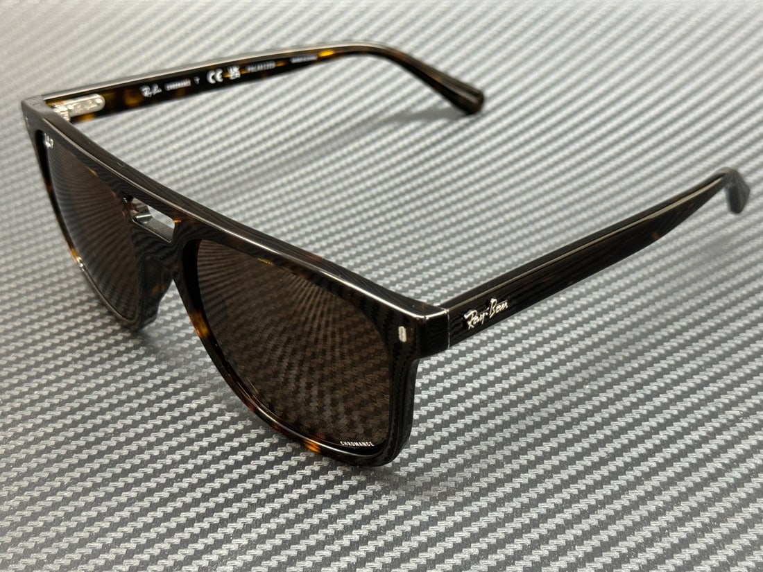 Ray-Ban RB2213CH 902 AN Havana Brown Polarized Sunglasses 58mm: Ray-Ban RB2213CH 902 AN Havana Brown Polarized Sunglasses 58mm Experience timeless style and exceptional quality with the Ray-Ban RB2213CH 902 AN sunglasses. These unisex sunglasses feature a sophisti