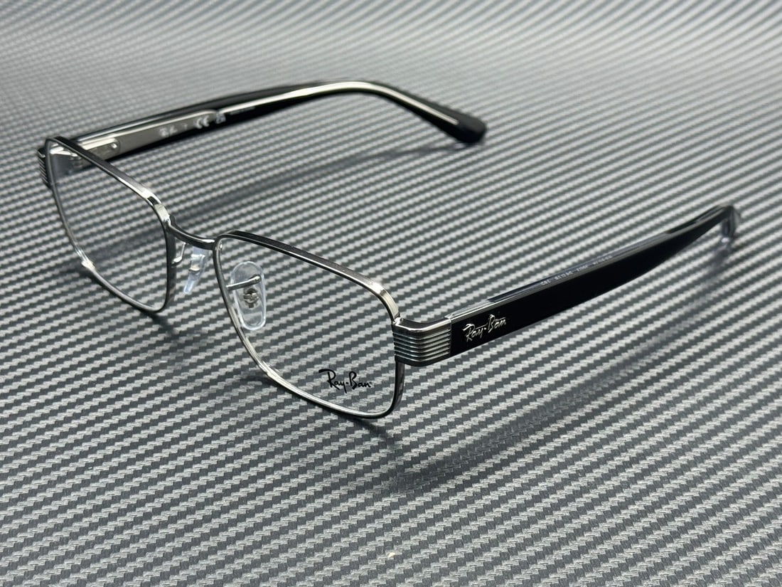 Ray-Ban RX6529 2502 Gunmetal 56mm Unisex Eyeglasses with Case: Ray-Ban RX6529 2502 Gunmetal 56mm Unisex Eyeglasses with Case Discover the stylish Ray-Ban RX6529 eyeglasses, designed for both men and women. Featuring a sleek gunmetal frame, these eyeglasses offer