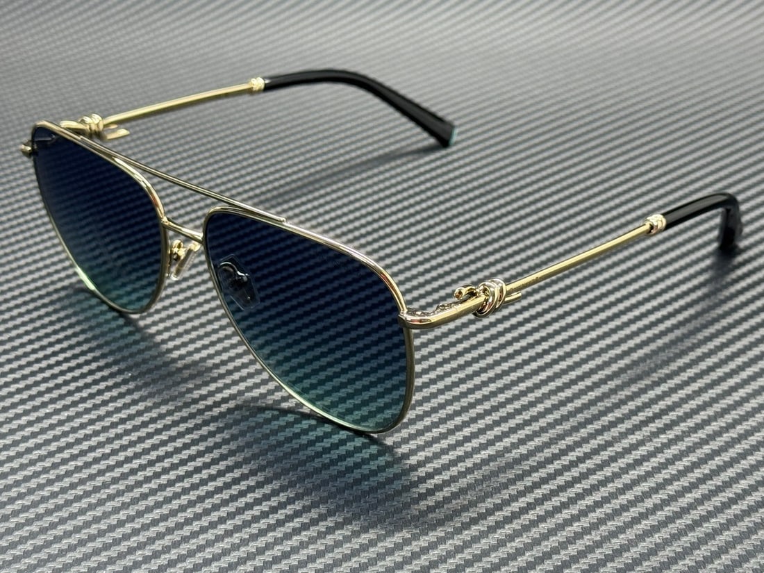 Tiffany TF3116 Pale Gold Sunglasses with Azure Blue Gradient Lenses 59mm: Tiffany TF3116 Pale Gold Sunglasses with Azure Blue Gradient Lenses 59mm These Tiffany & Co. TF3116 62029S sunglasses feature a pale gold frame paired with azure blue gradient lenses. The sunglasses h